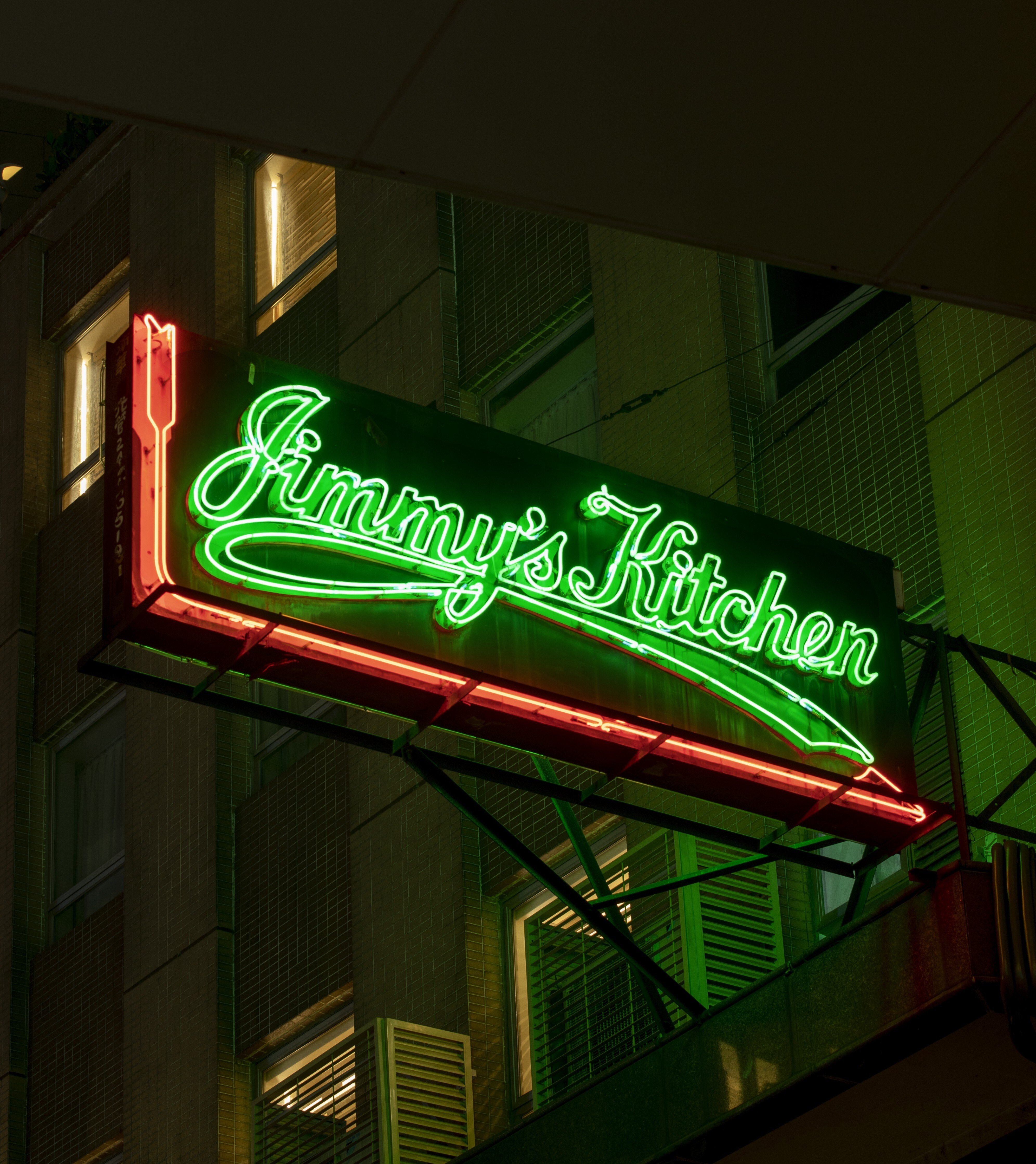 The neon sign for Jimmy's Kitchen on Wyndham Street, in Central, Hong Kong. Photo: Antony Dickson