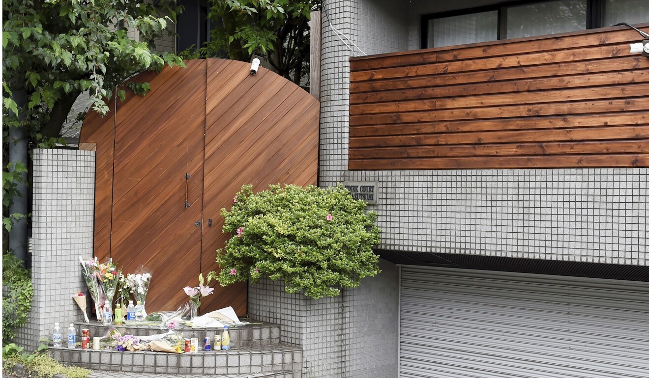 Flowers are placed at a shooting location for the Netflix reality show Terrace House in Tokyo after the death of cast member Hana Kimura. Photo: Kyodo