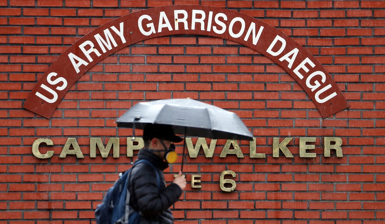 A man walks past a US army base in Daegu, South Korea. Photo: Reuters