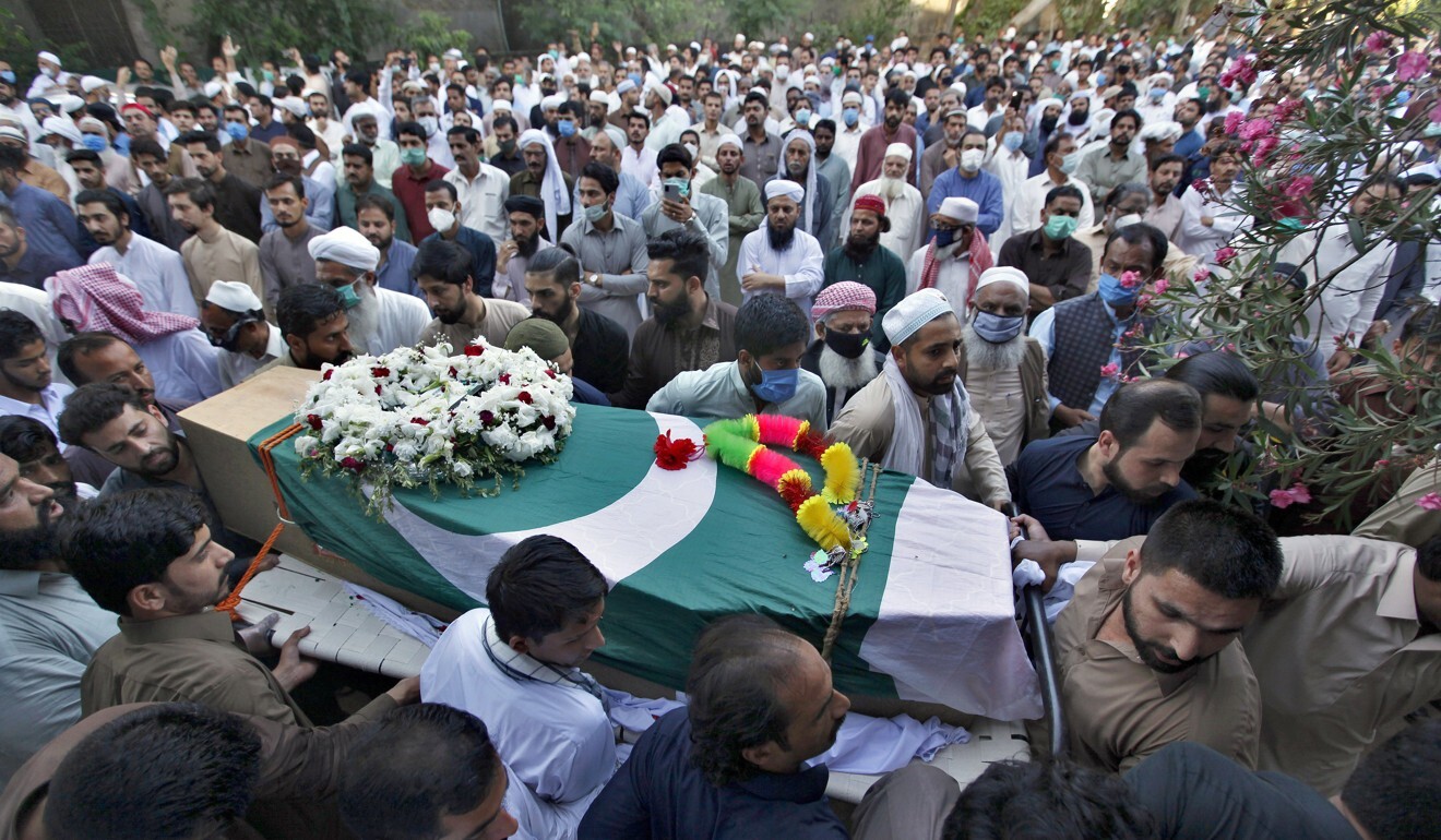 People attend funeral prayers for victims of last week’s plane crash. Photo: AP
