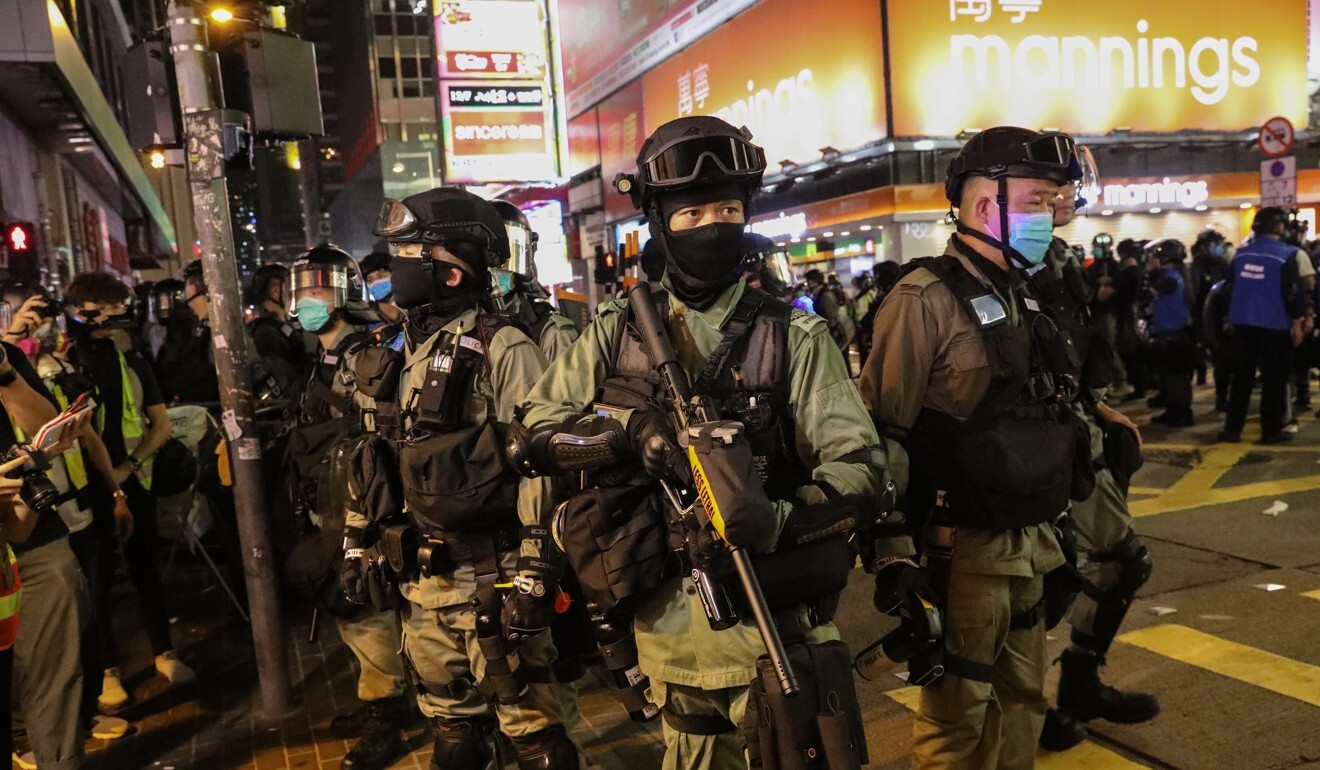 Riot police in Mong Kok during a demonstration on Wednesday against the national anthem and national security laws. Photo: Sam Tsang