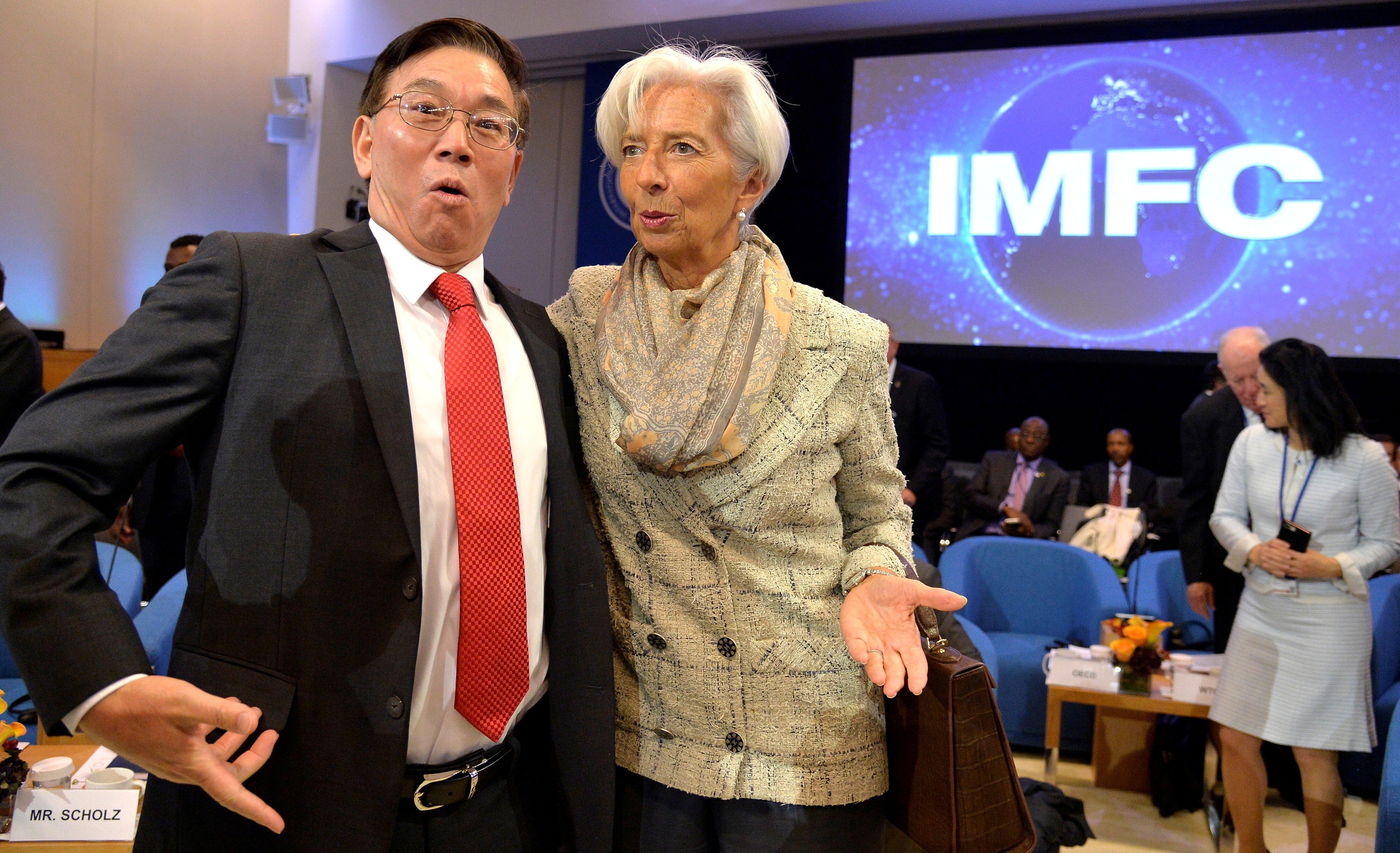 International Monetary Fund China staff member Lin Jianhai and European Central Bank president Christine Lagarde attend the IMF Finance Committee Plenary on October 19 last year. Photo: Reuters