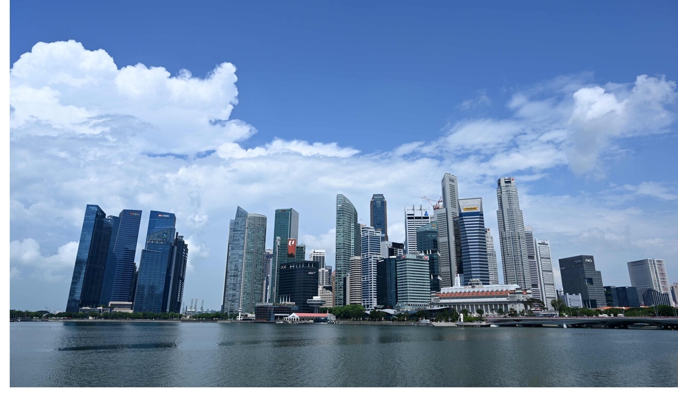 The Singapore skyline is seen across Marina Bay. Photo: AFP