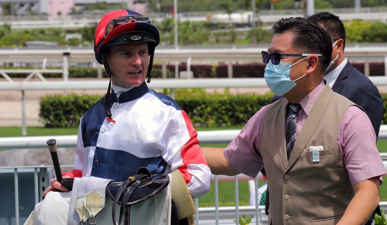 Dennis Yip with jockey Zac Purton after Racing Fighter’s victory.