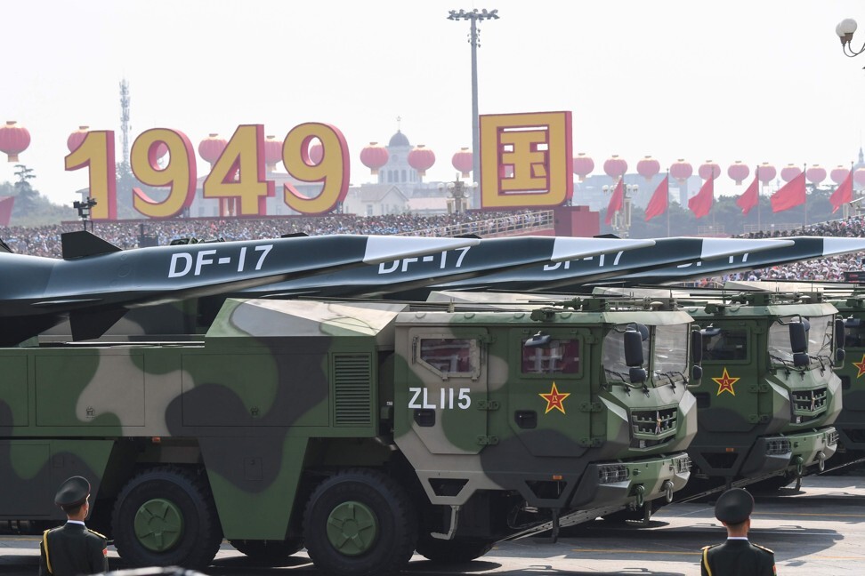 Military vehicles carrying DF-17 missiles take part in China’s National Day parade in Beijing. Photo: AFP