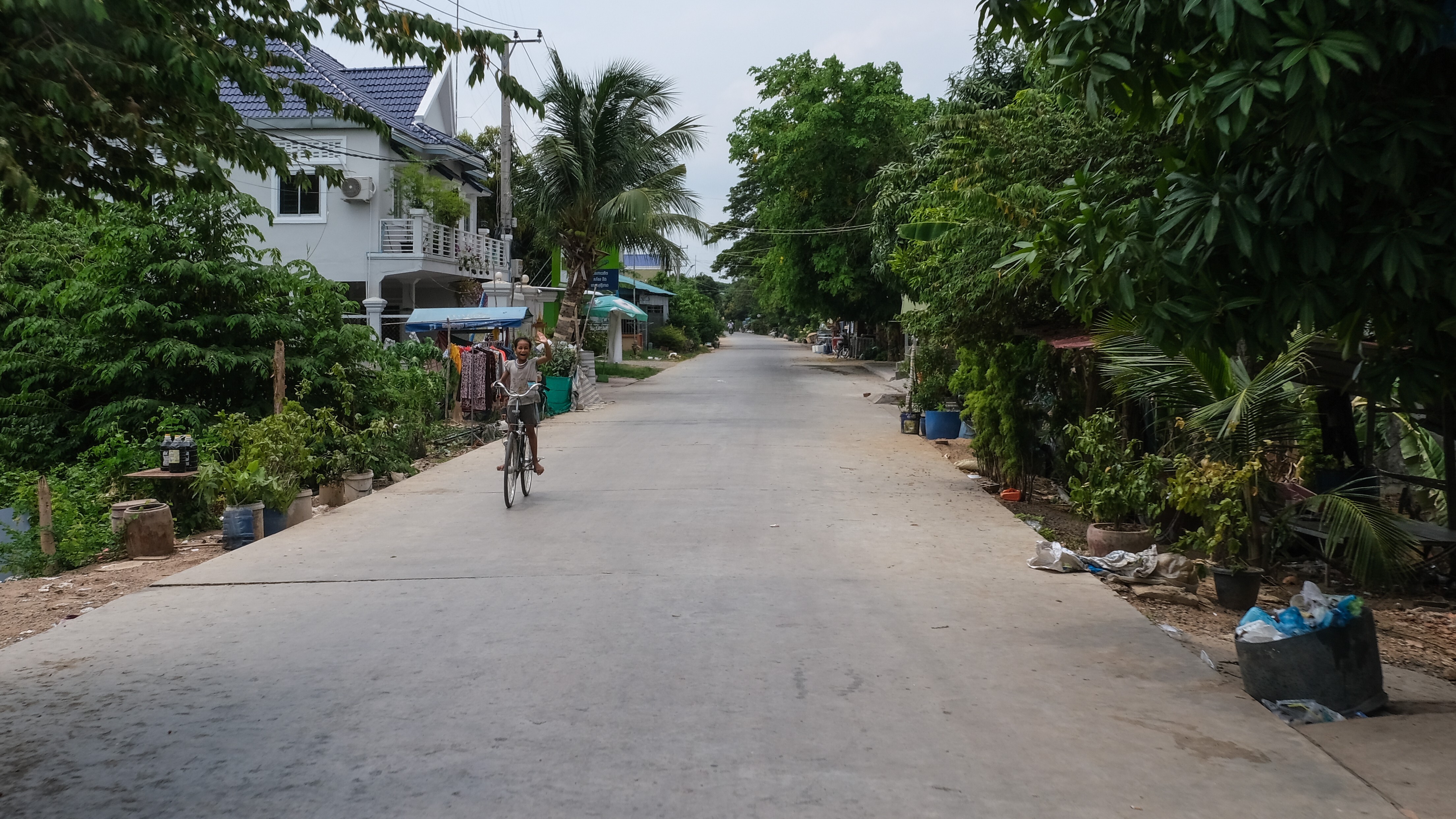 Cycling through modest tree-shaded villages feels far away from the bustle of the nearby city, Phnom Penh Photo: Pete Ford [FEATURES 2020]