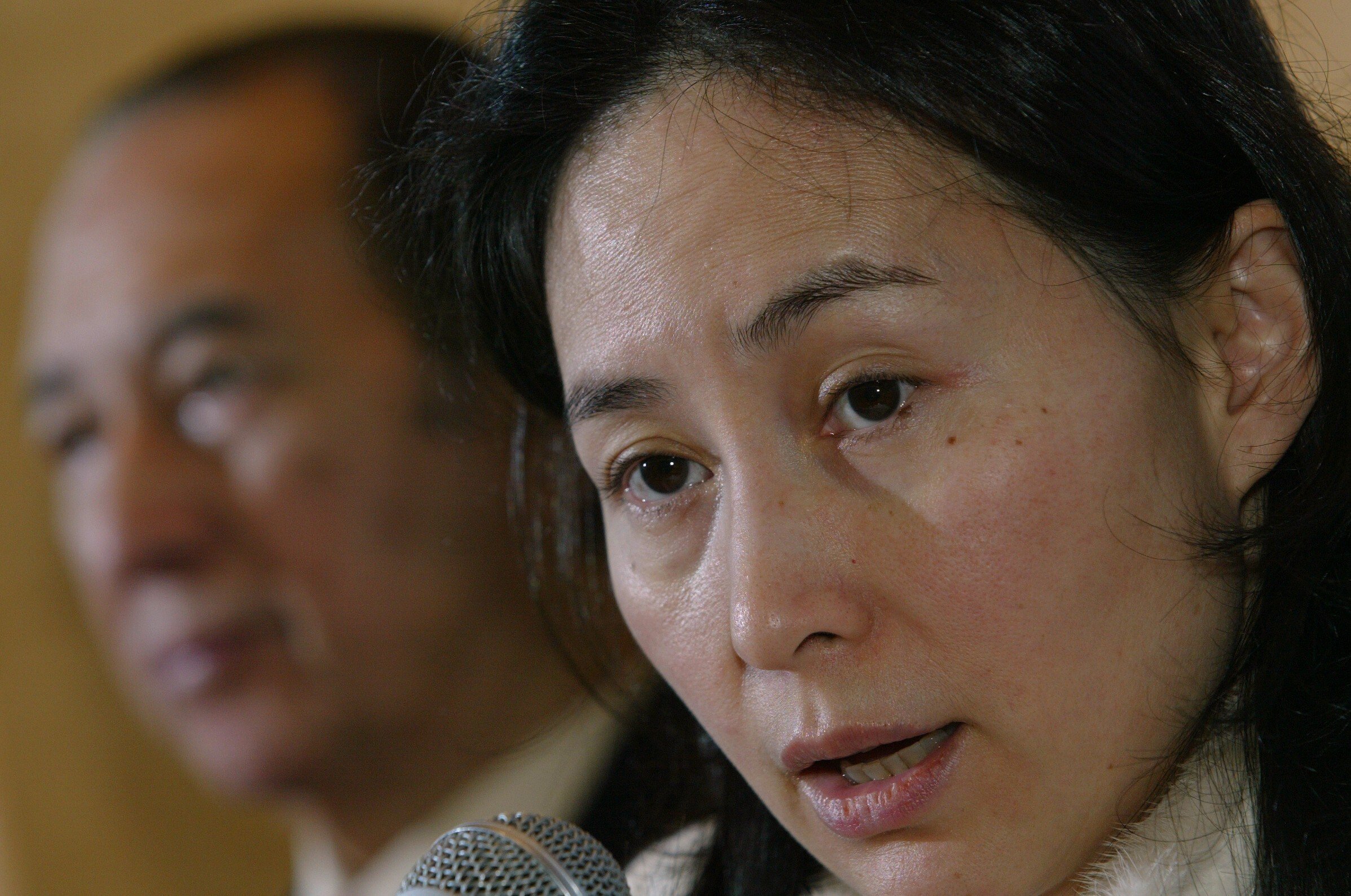Stanley Ho (left, background) and Pansy Ho (foreground, right) at Shun Tak Holdings’ media conference on 19 January 2006. Photo: SCMP