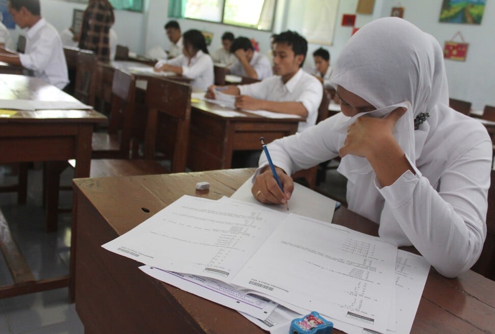 Some families in Indonesia do not believe girls need an education, an activist says. File photo: AFP