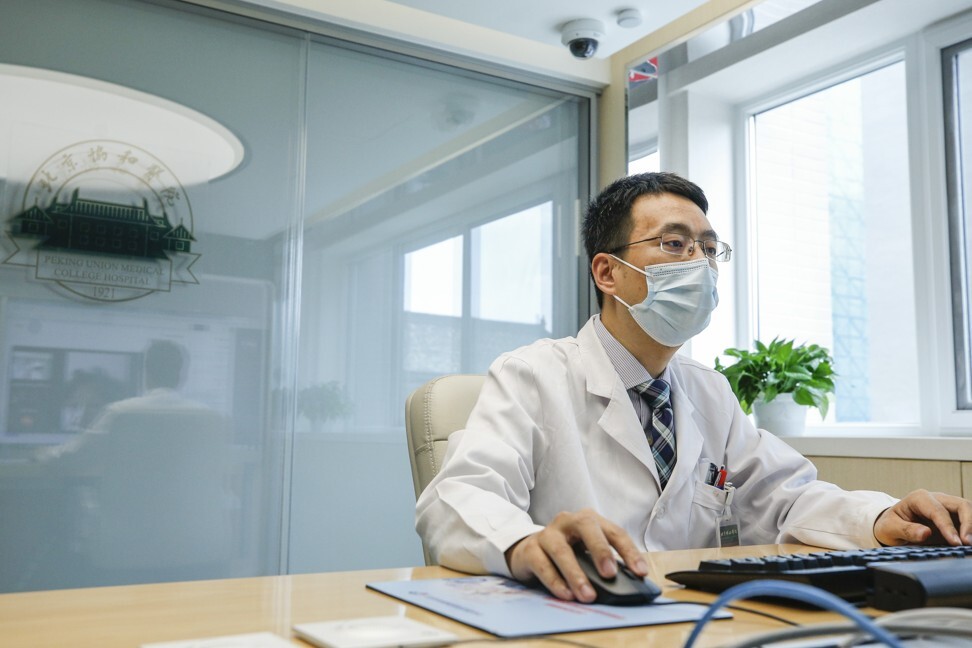 Endocrinologist Zhang Huabing talks to patients via video link in Peking Union Medical College Hospital on May 25. Photo: Xinhua