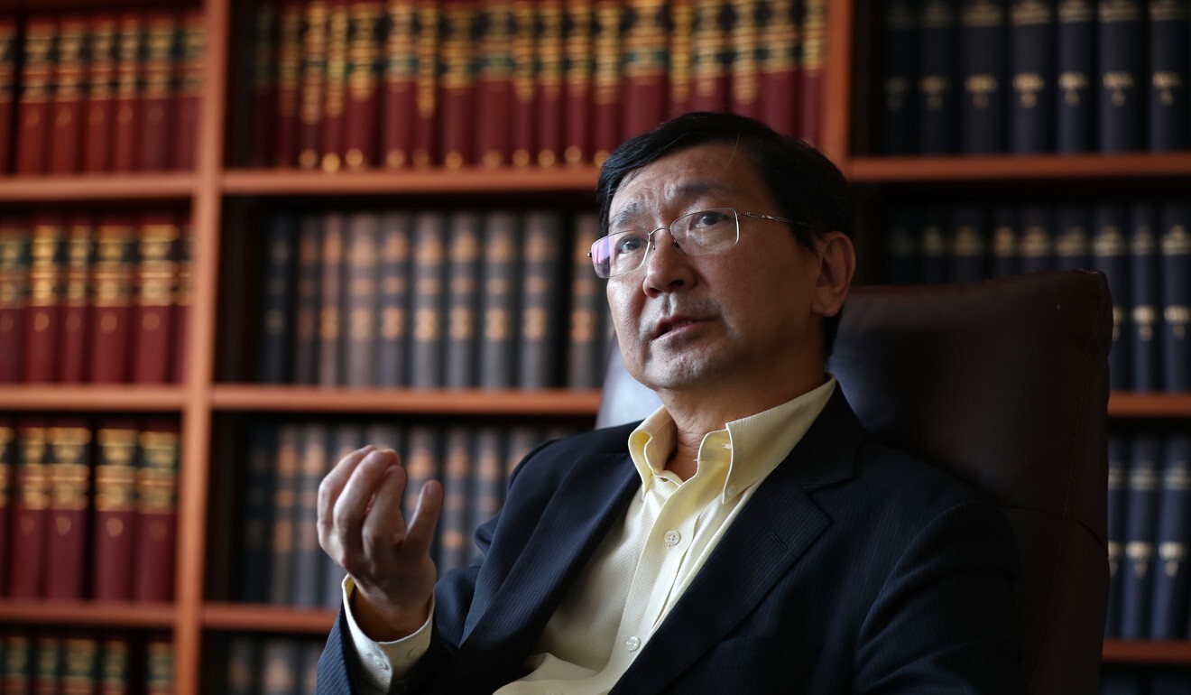 Johannes Chan, of the University of Hong Kong, wants answers to whether local courts will be allowed to strike down provisions of the national security law. Photo: Nora Tam