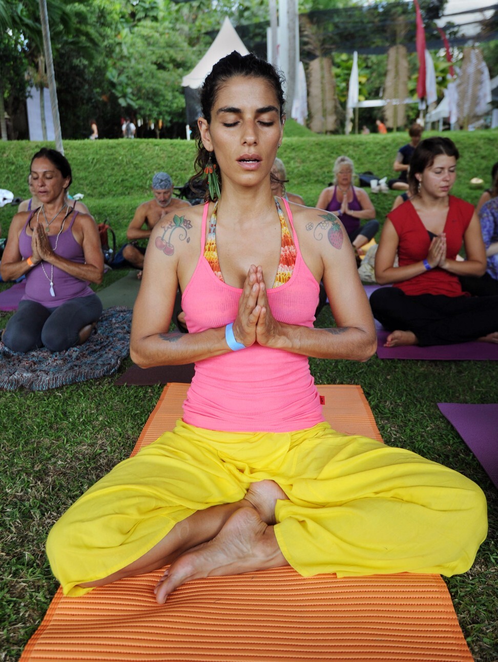 A group of yoga practitioners in Ubud. Photo: AFP