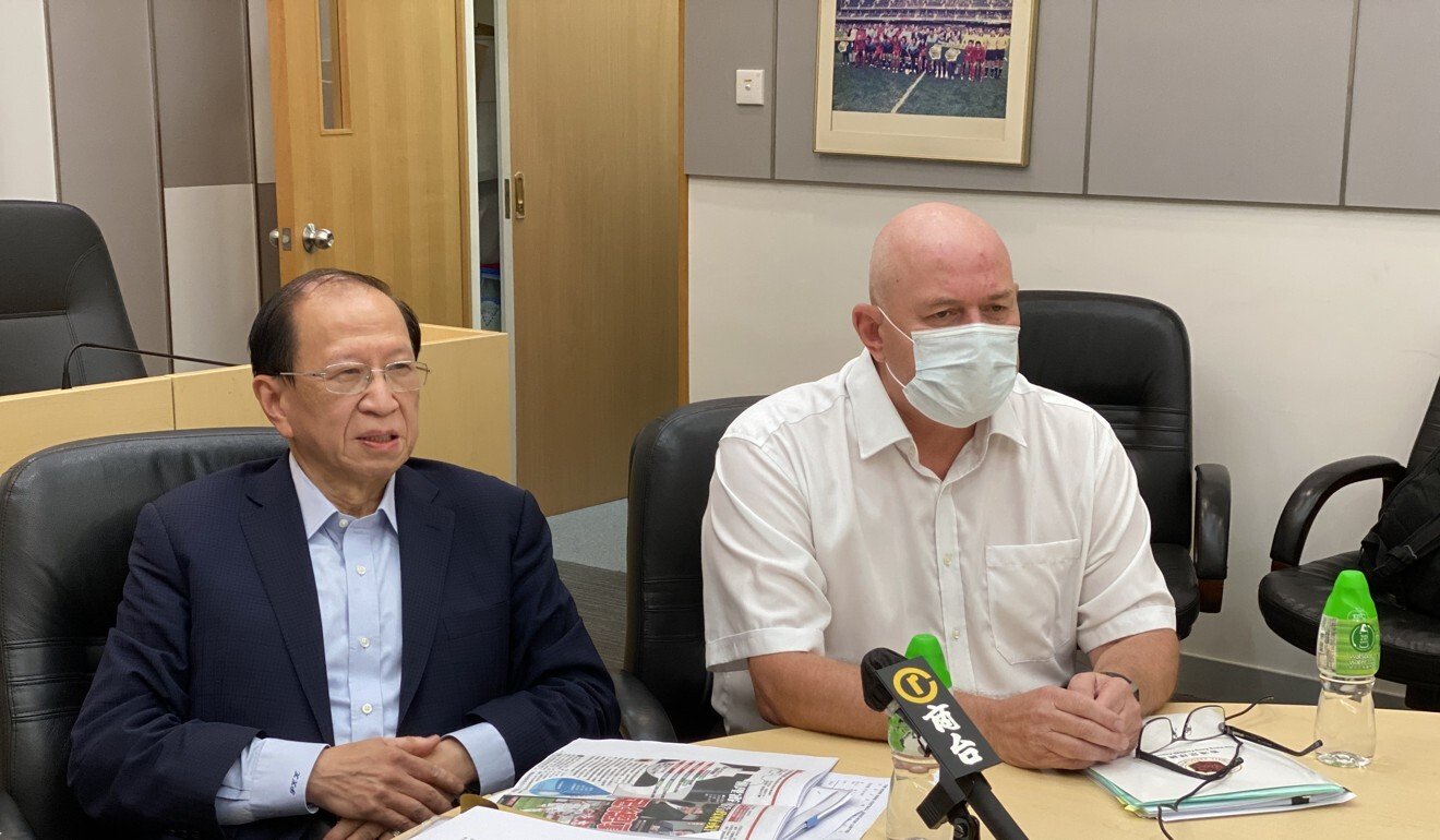 HKFA chairman Pui Kwan-kay and outgoing chief executive Paul Woodland. Photo: Chan Kin-wa