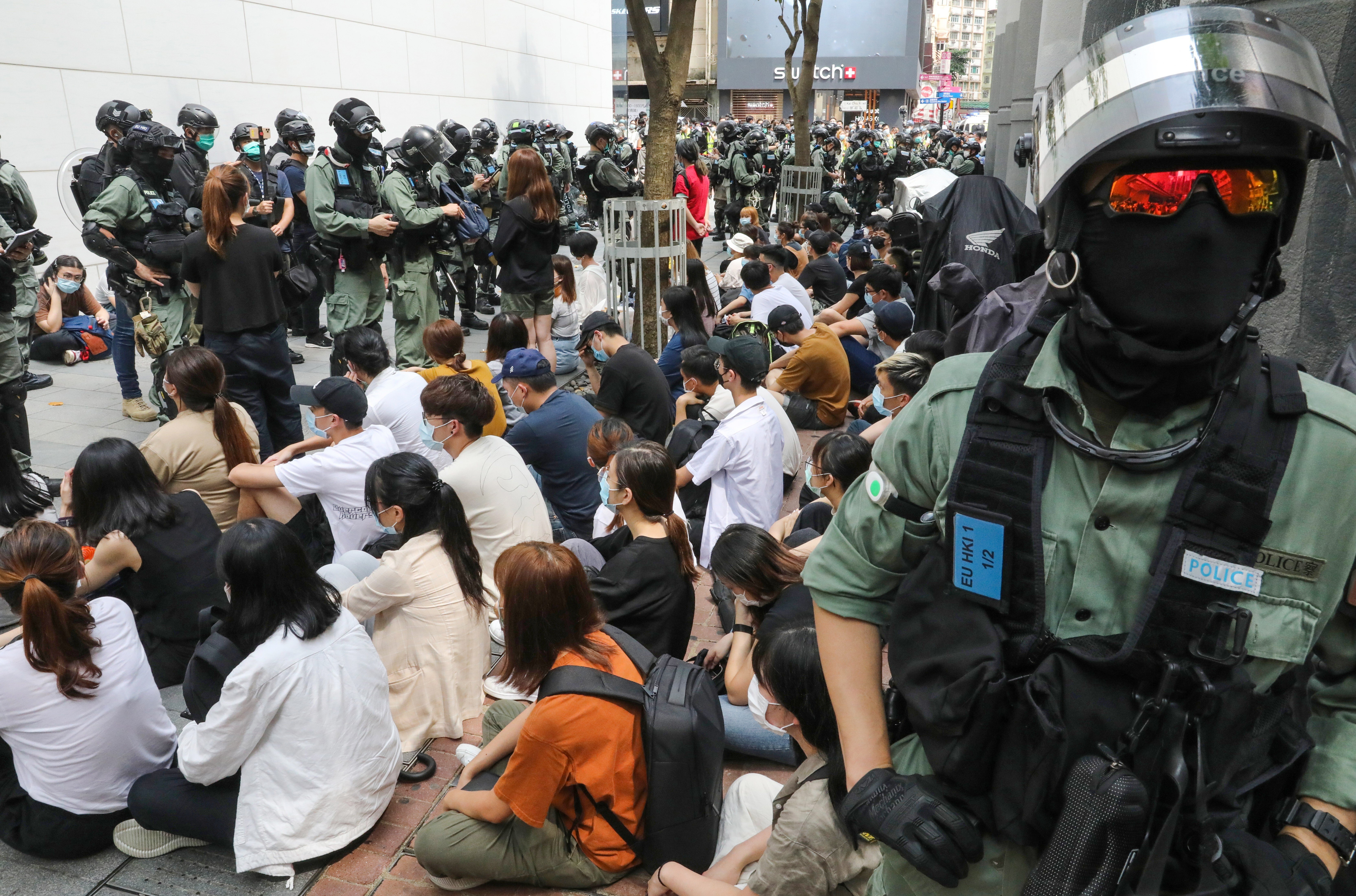 A group of anti-government protestors are detained by the police during a demonstration in Causeway Bay on May 27. Photo: Dickson Lee