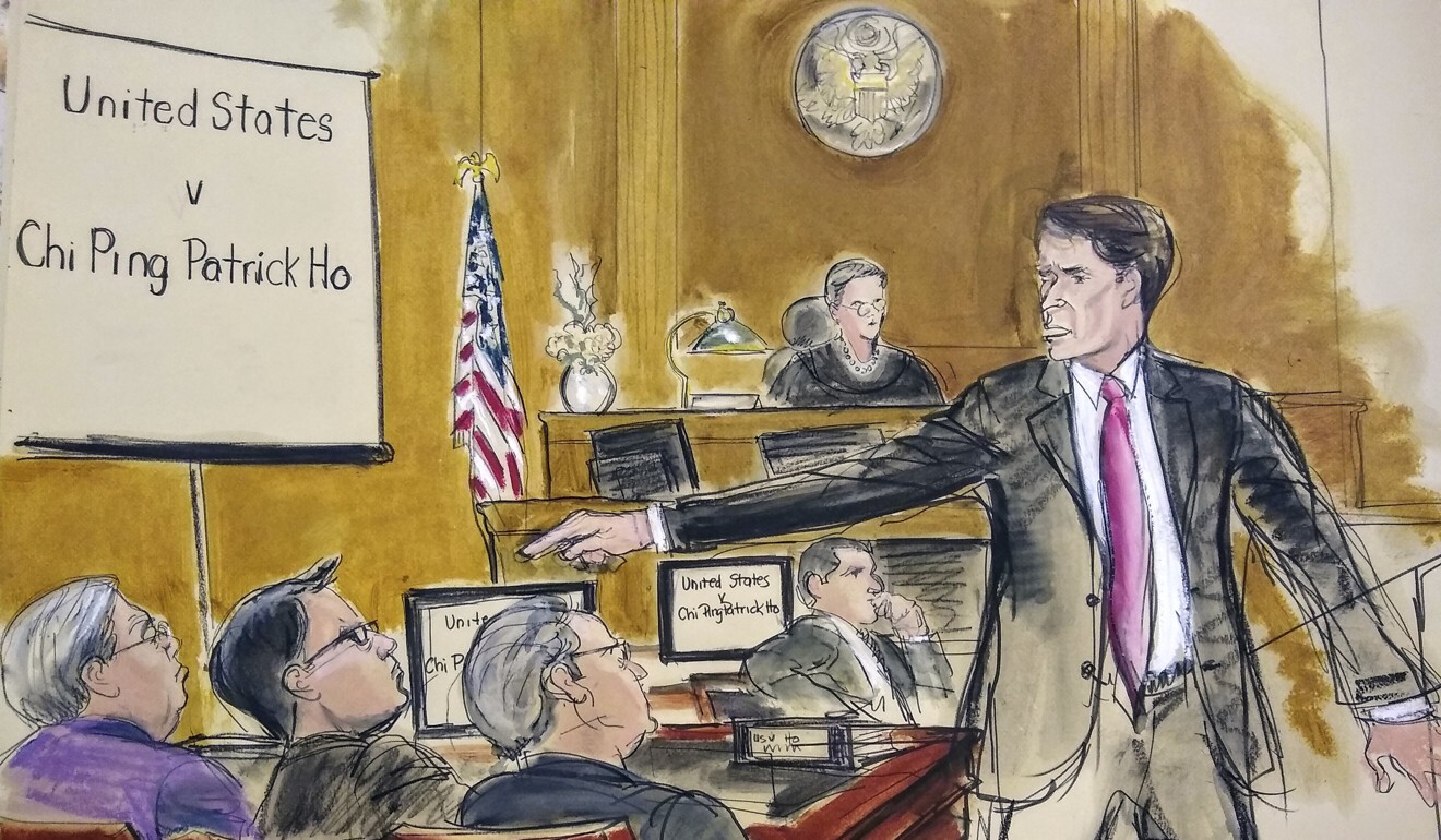 A US prosecutor points at Patrick Ho (seated far left) during opening statements in November 2018. Photo: AP