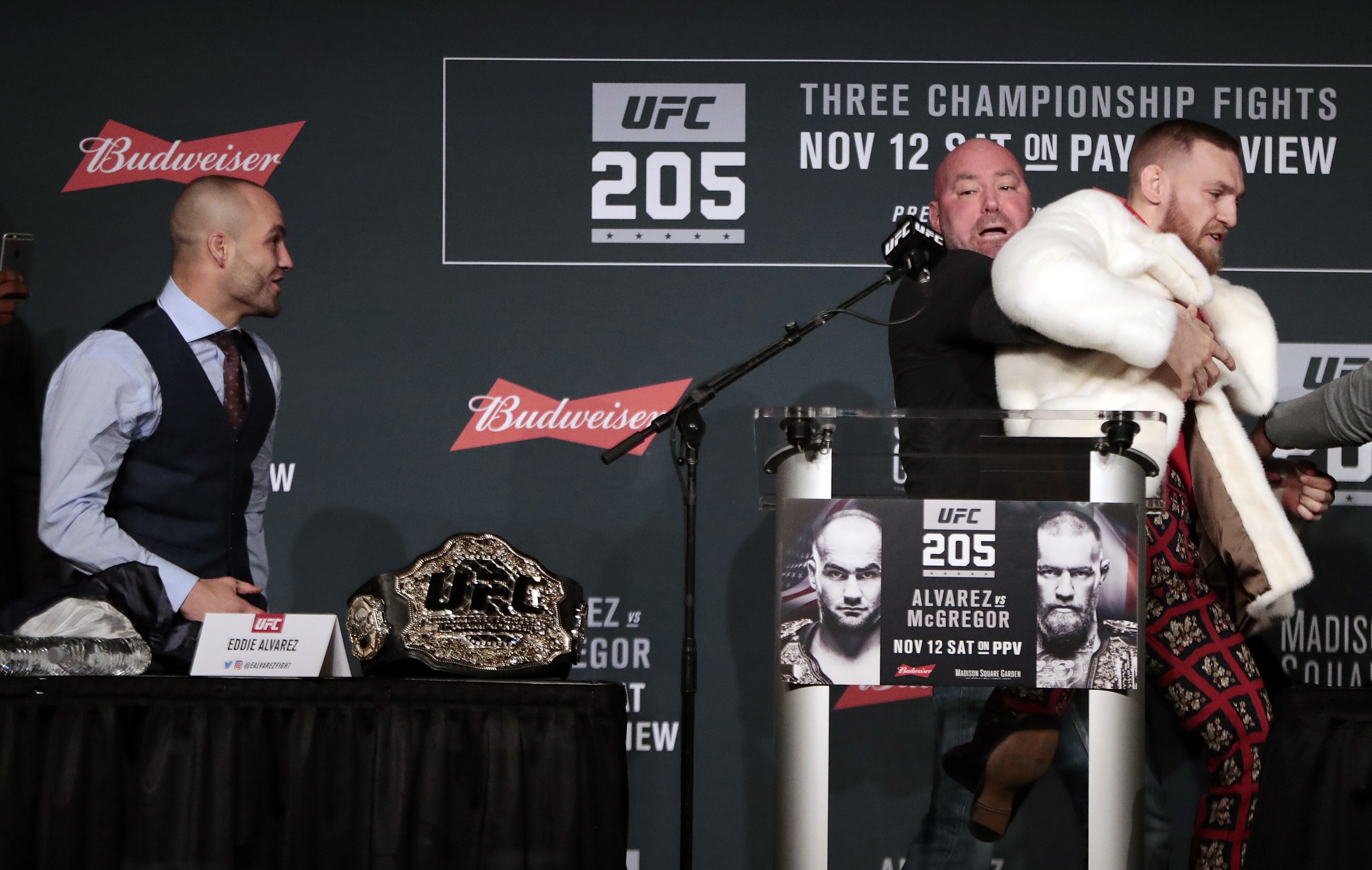 Conor McGregor is restrained by UFC president Dana White during a press conference before his fight against Eddie Alvarez at UFC 205 in Madison Square Garden, New York in 2016. Photo: AP