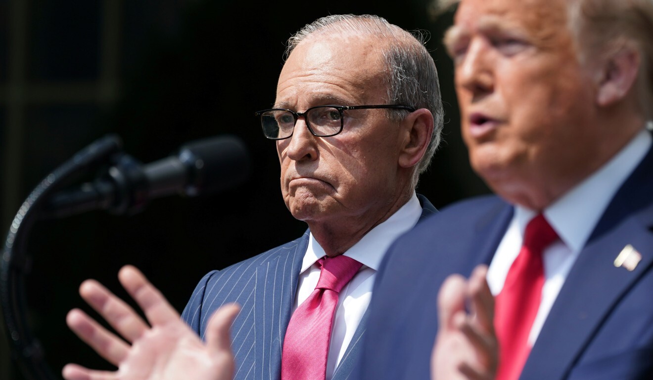 White House economic adviser Larry Kudlow listening as US President Donald Trump talks at a news briefing in Washington. Kudlow said the administration was exploring a tax cut for corporations that return their supply chains from overseas. Photo: Reuters