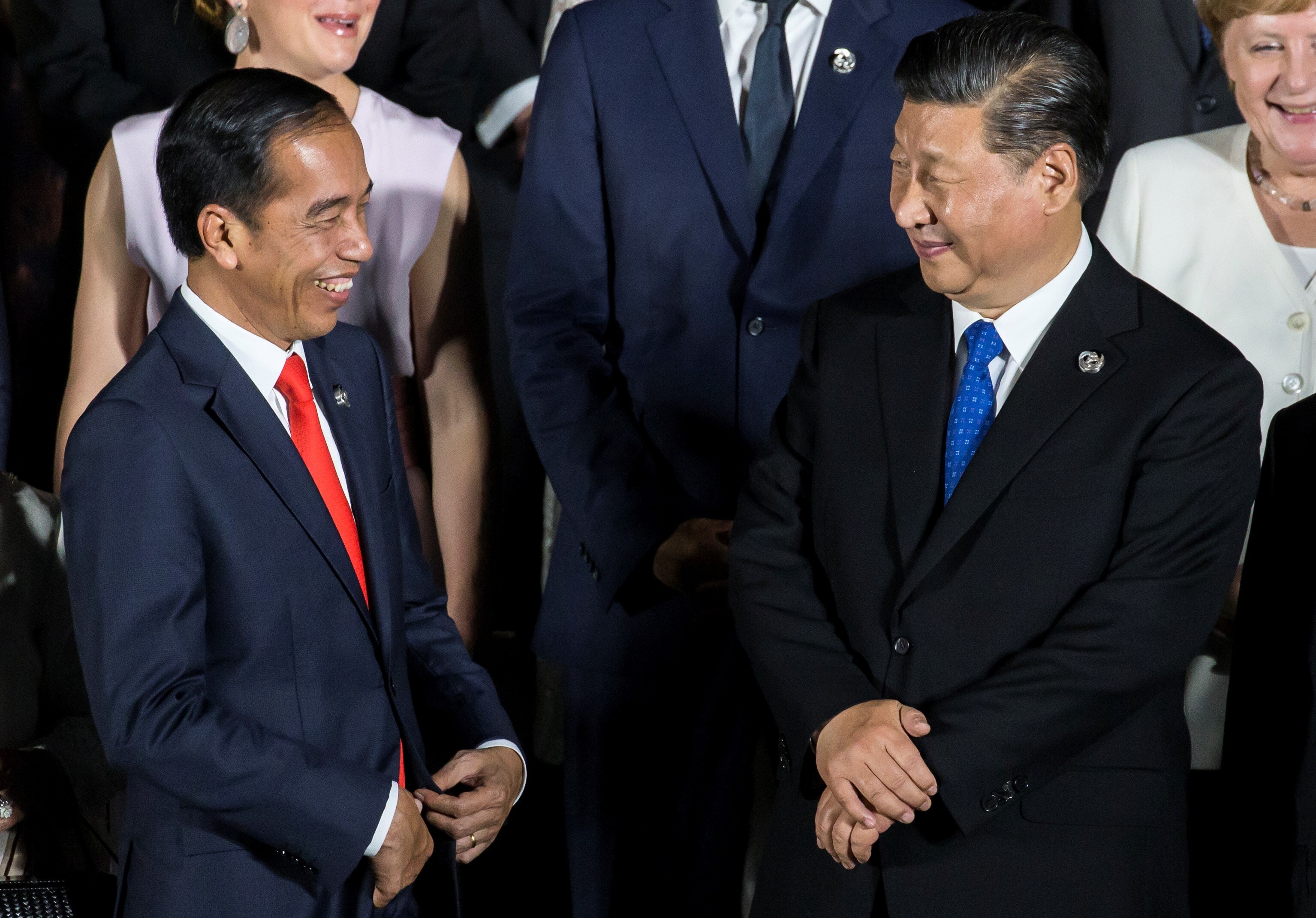Indonesia's President Joko Widodo speaks to China's President Xi Jinping during a photo session at the G20 summit in Osaka last June. Photo: Reuters