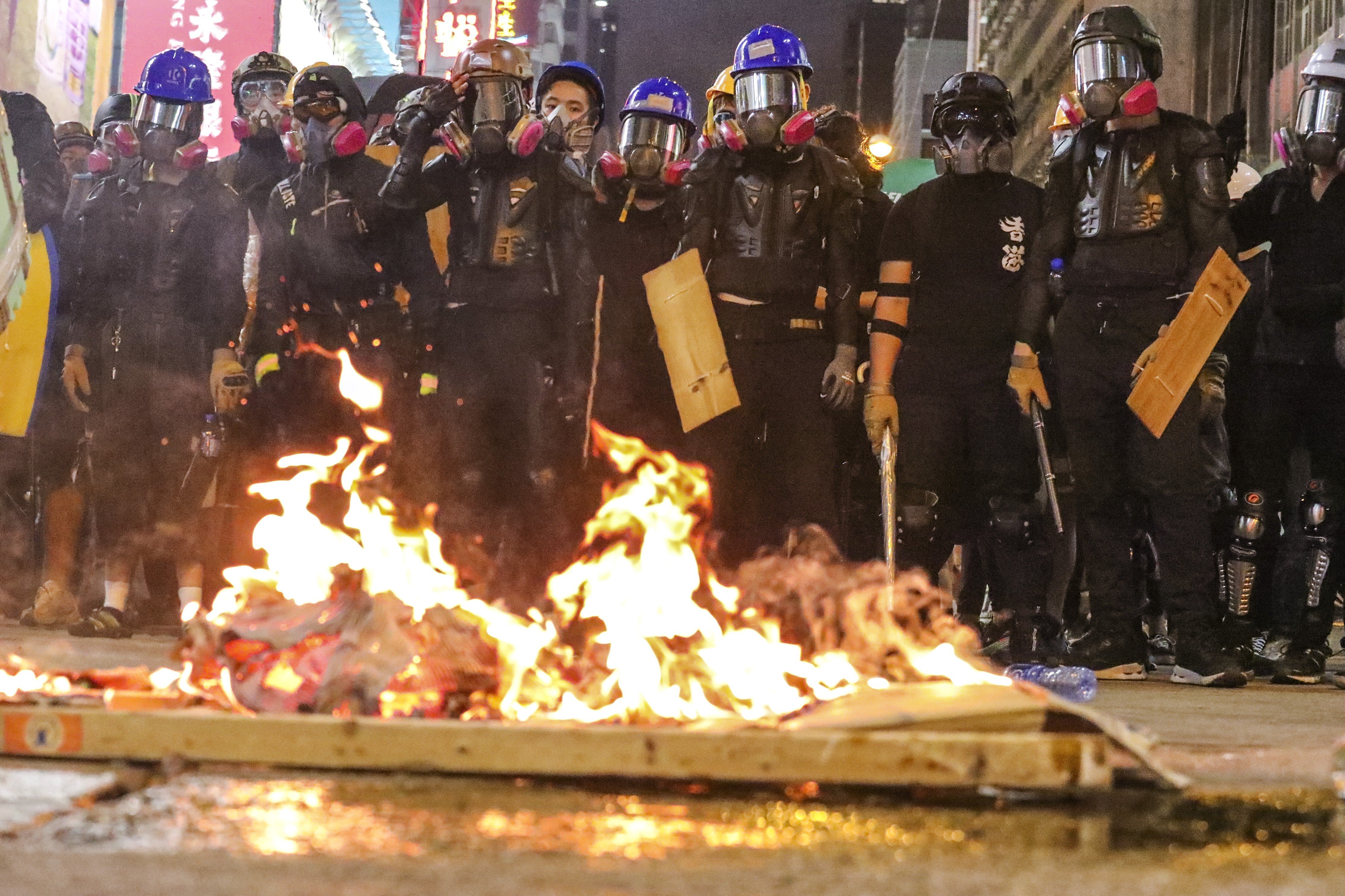Radical protesters set a fire on Nathan Road in Mong Kok. Photo: Felix Wong
