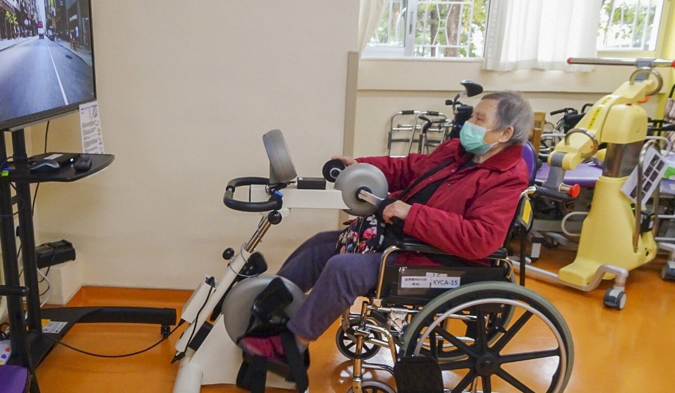 Chan Sim, 92, rides an exercise bike. Photo: Handout