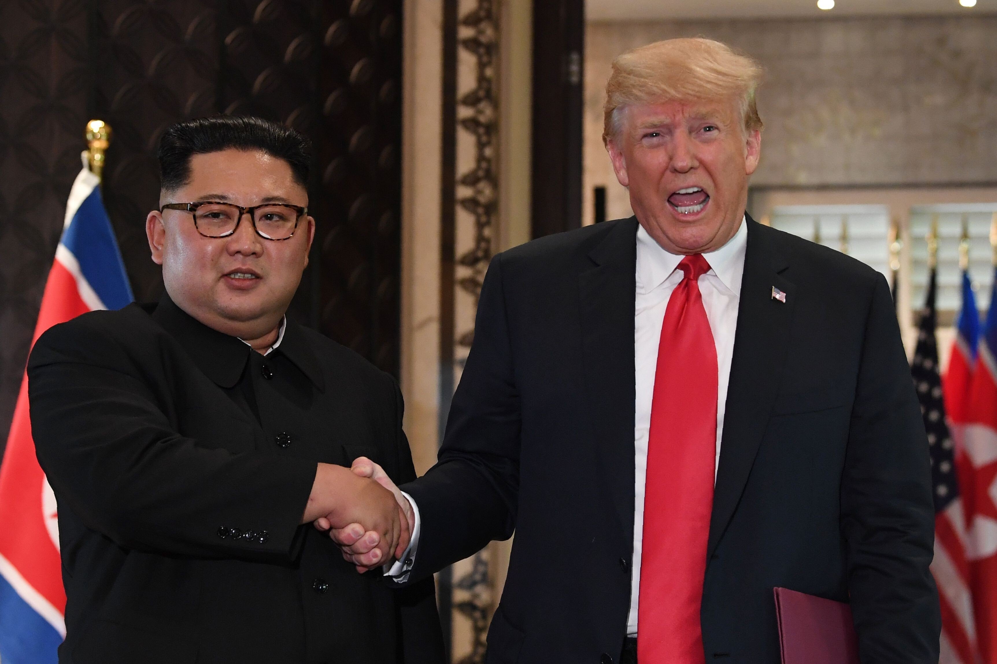 North Korean leader Kim Jong-un shakes hands with US President Donald Trump in Singapore on June 12, 2018. File photo: AFP