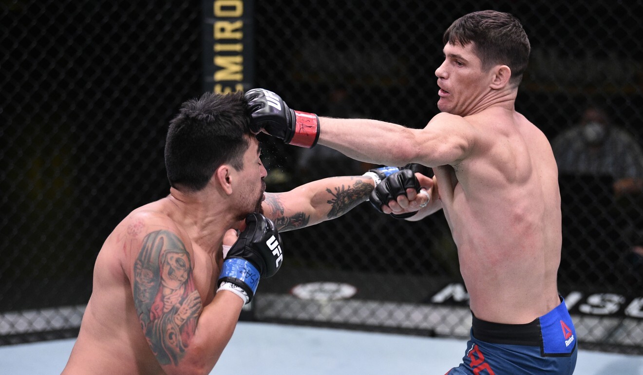 Charles Rosa punches Kevin Aguilar in their lightweight fight at UFC Fight Night on Saturday. Photo: USA Today