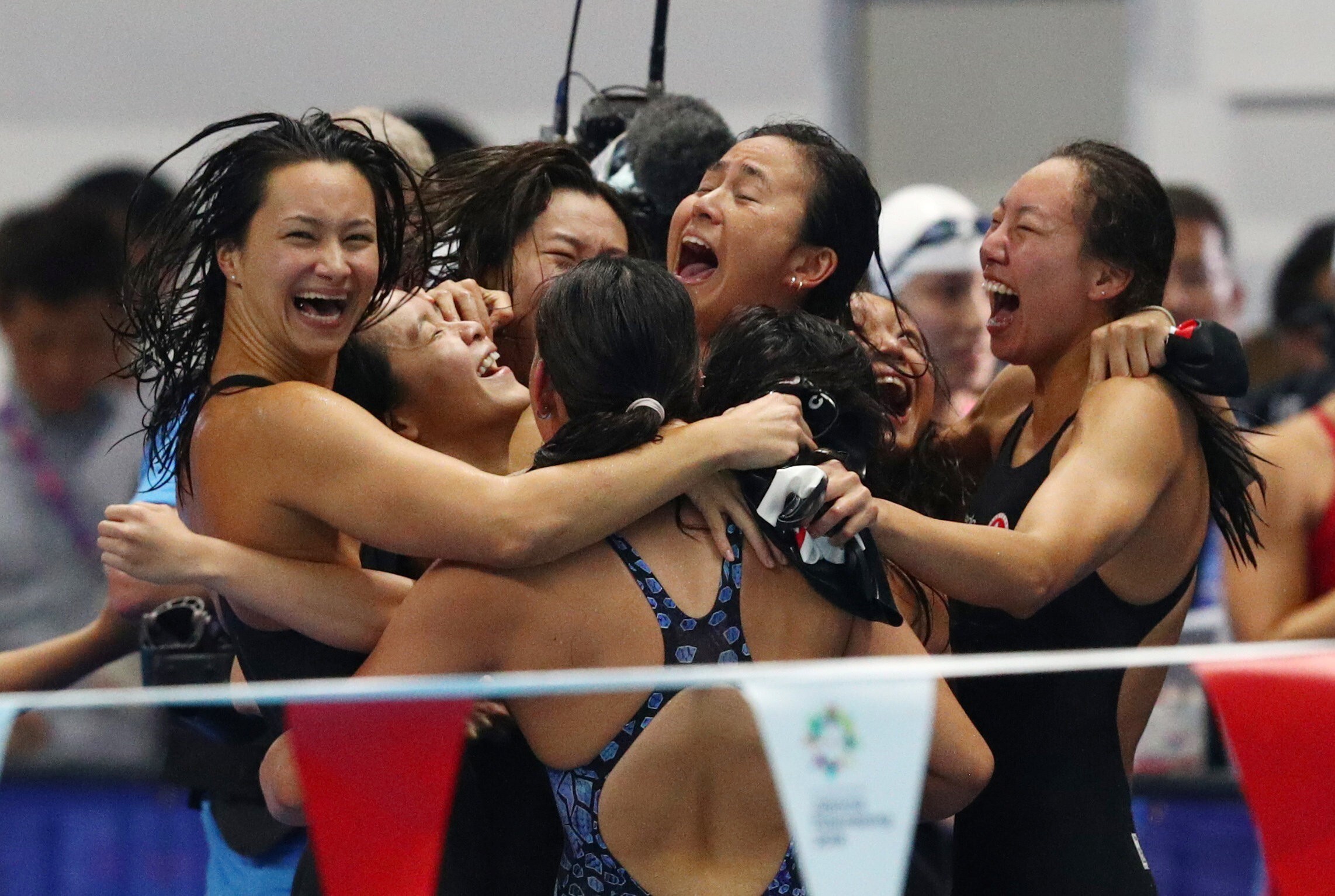 Hong Kong women’s medley relay team celebrate after capturing a silver medal at the 2018 Asian Games in Jakarta. Photo: Reuters