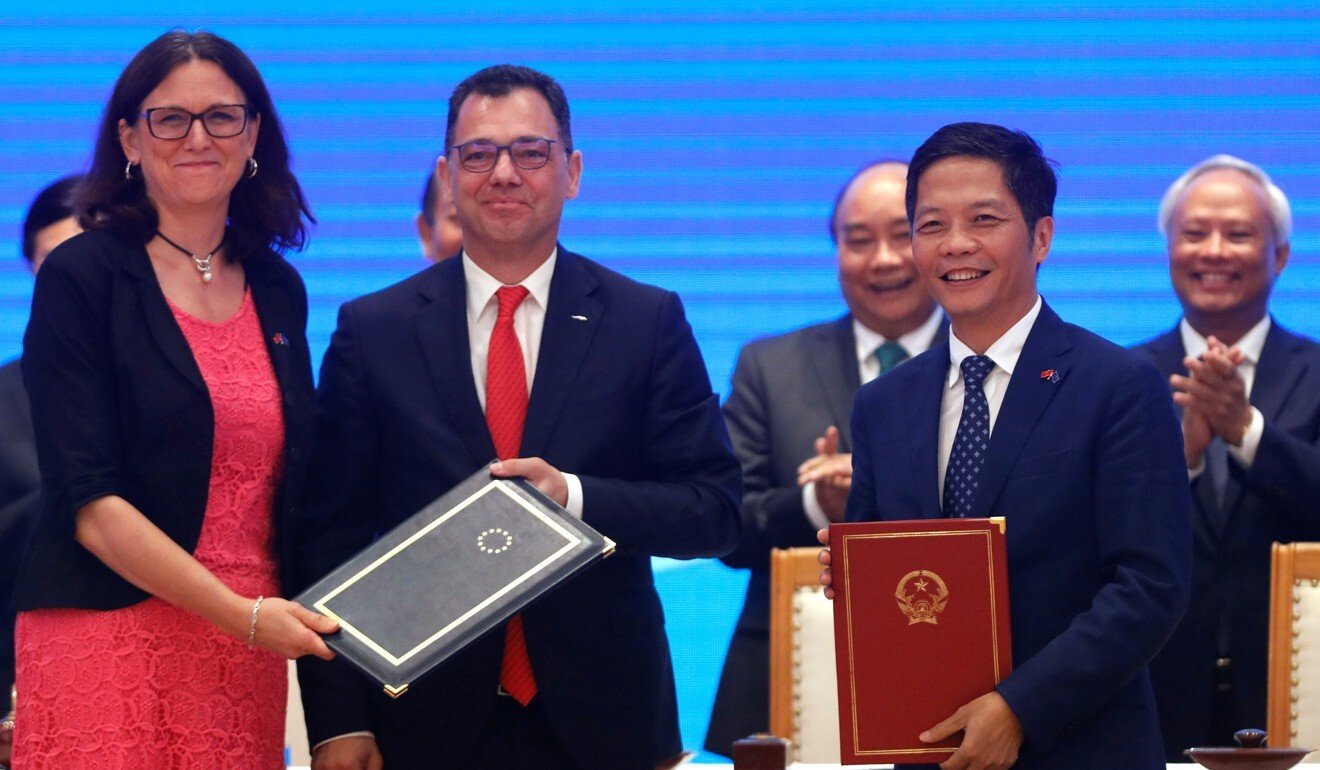 The signing ceremony of the EU-Vietnam Free Trade Agreement at Government Office in Hanoi. Photo: Reuters