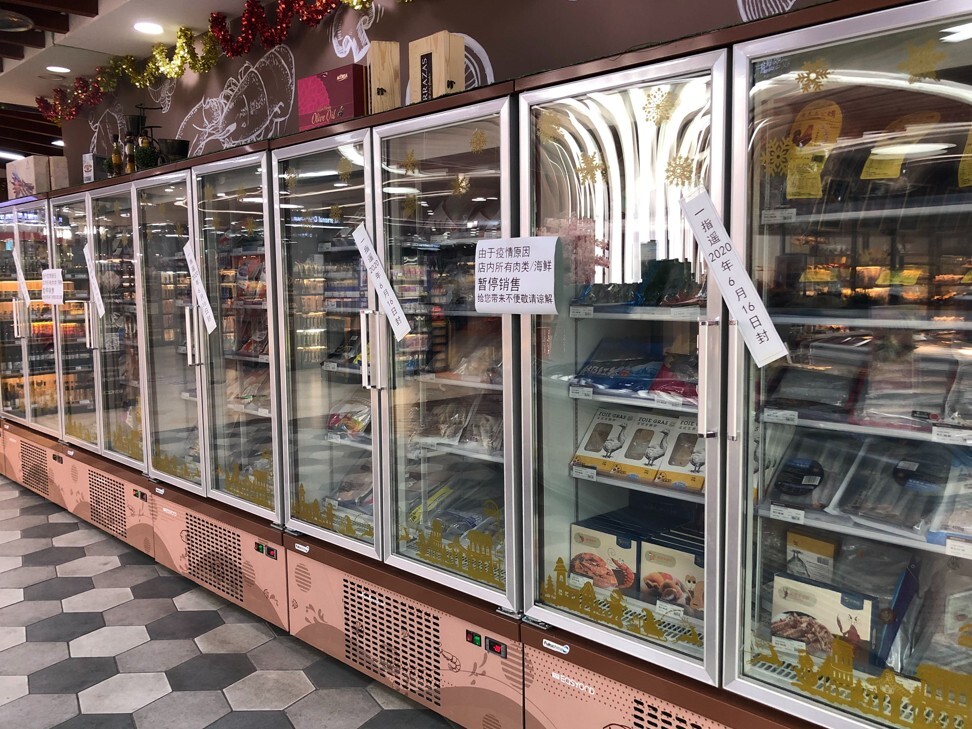 An import supermarket in the Wangfujing district of Beijing on Tuesday evening had suspended the sales of all imported meat and seafood. Photo: Orange Wang