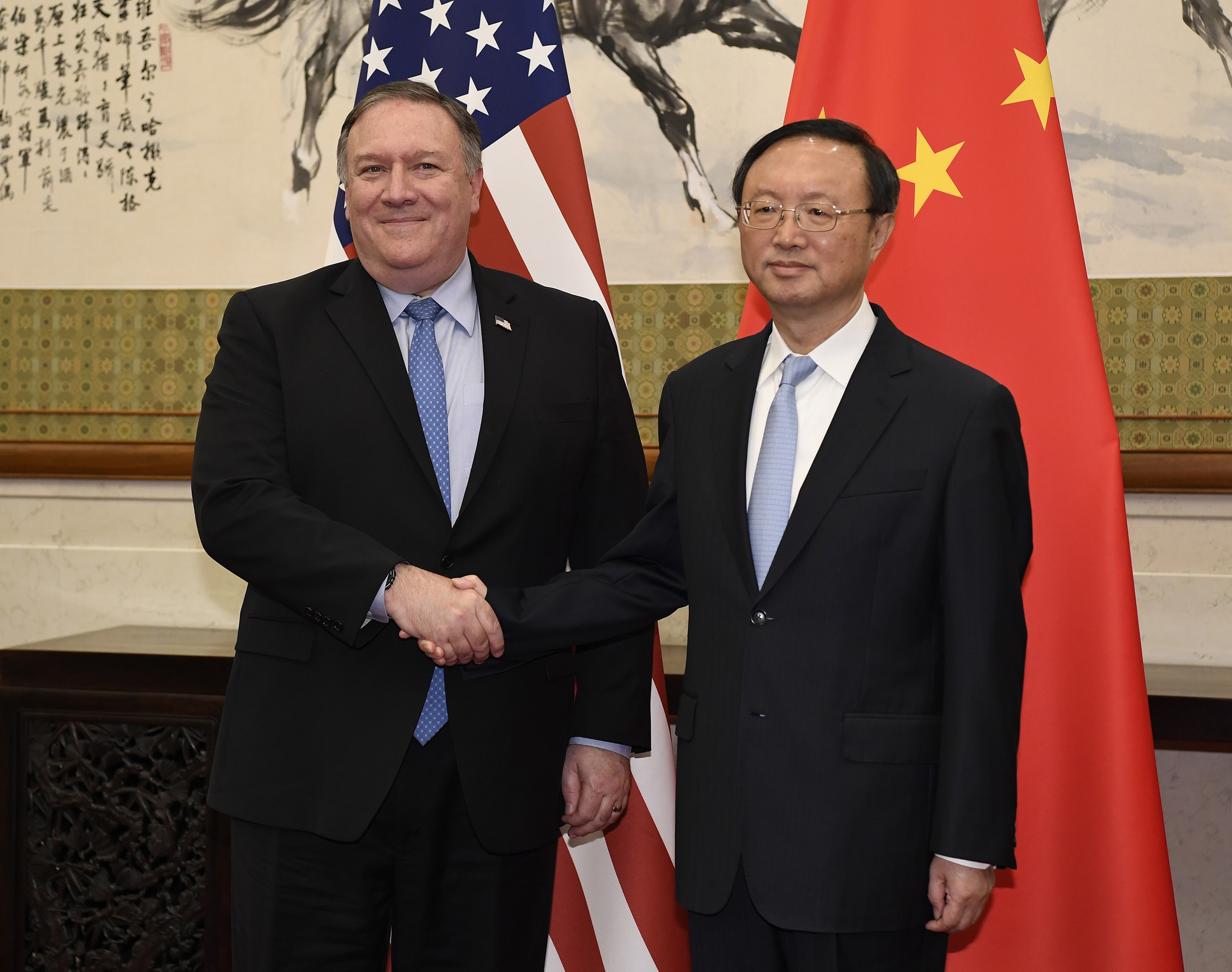 Secretary of State Mike Pompeo shakes hands with Yang Jiechi, a member of the Political Bureau of the Chinese Communist Party during their meeting in Beijing in October 2018. Photo: AP