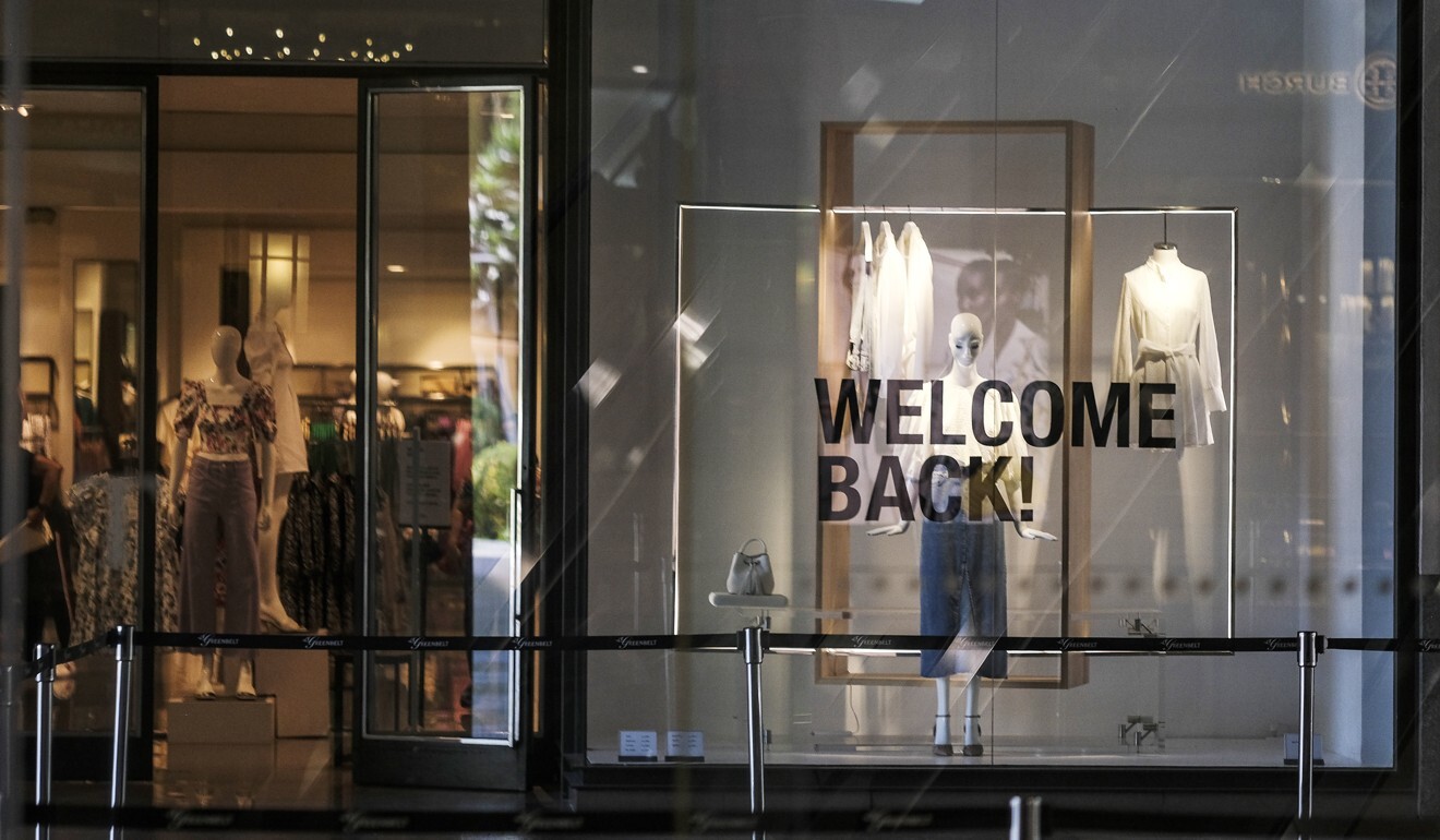 A ‘Welcome Back’ sign is displayed in the window of a fashion store in Makati City, Metro Manila. Consumer spending accounts for more than 70 per cent of the Philippines’ economy. Photo: Bloomberg