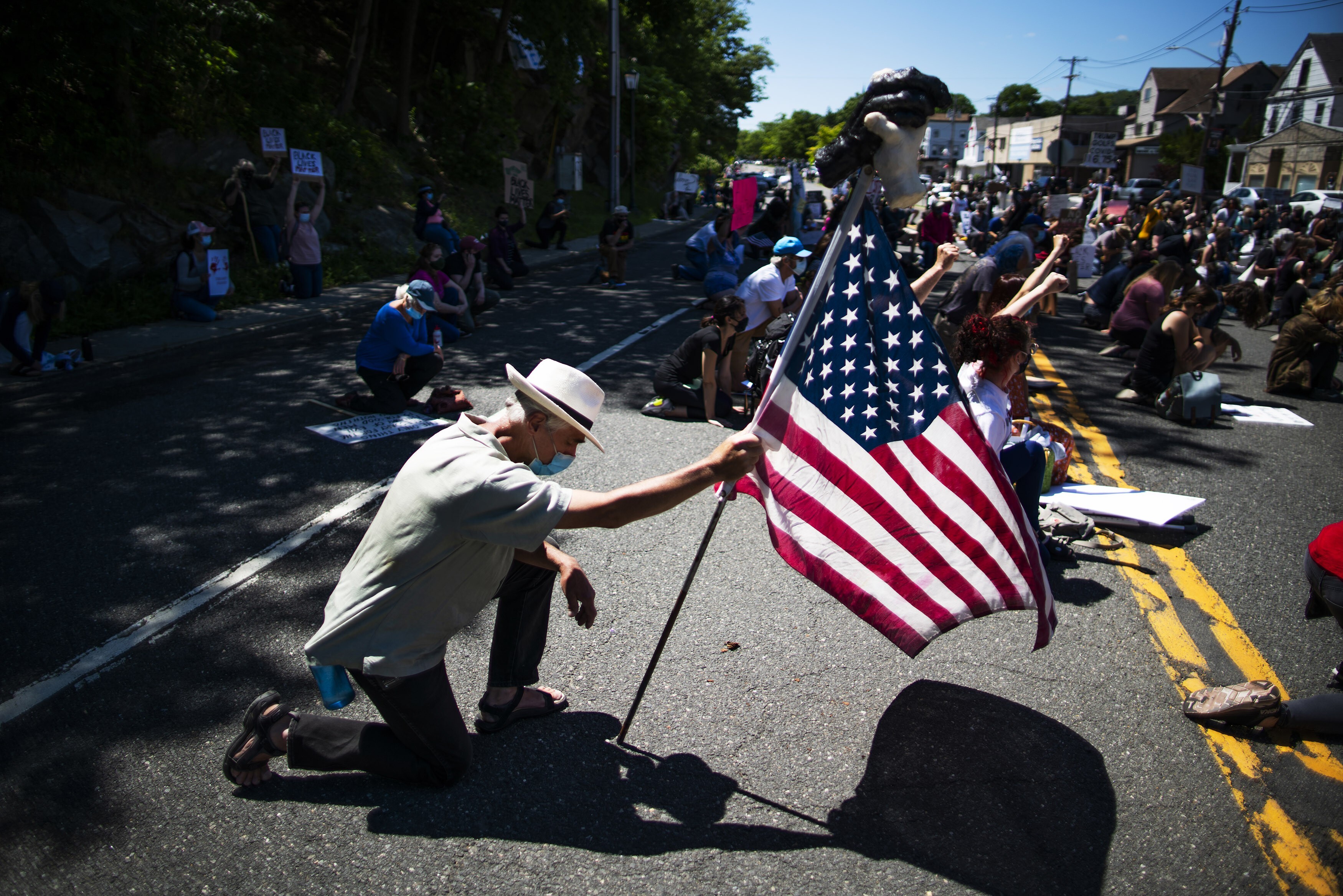 Demonstrators kneel during a solidarity protest for George Floyd on June 13 in West Point, New York. Photo: AP