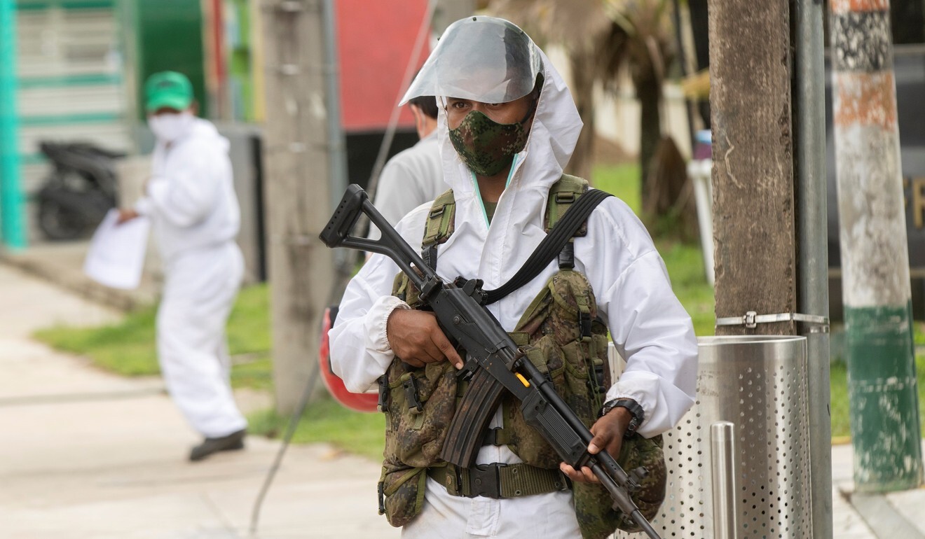 Brazilian soldiers carry out sanitary controls. Photo: EPA