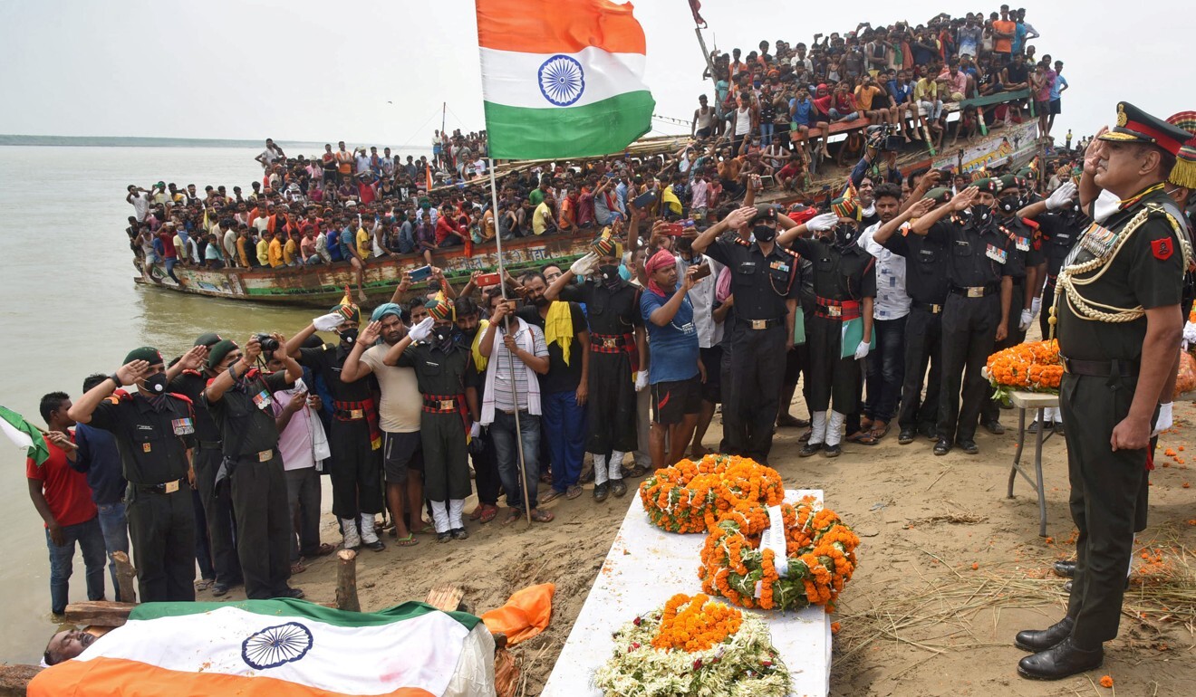 Army officers pay tribute to an Indian soldier killed in a border clash with Chinese troops in the Ladakh region, before his cremation in Maner, in the eastern state of Bihar, India. Photo: Reuters