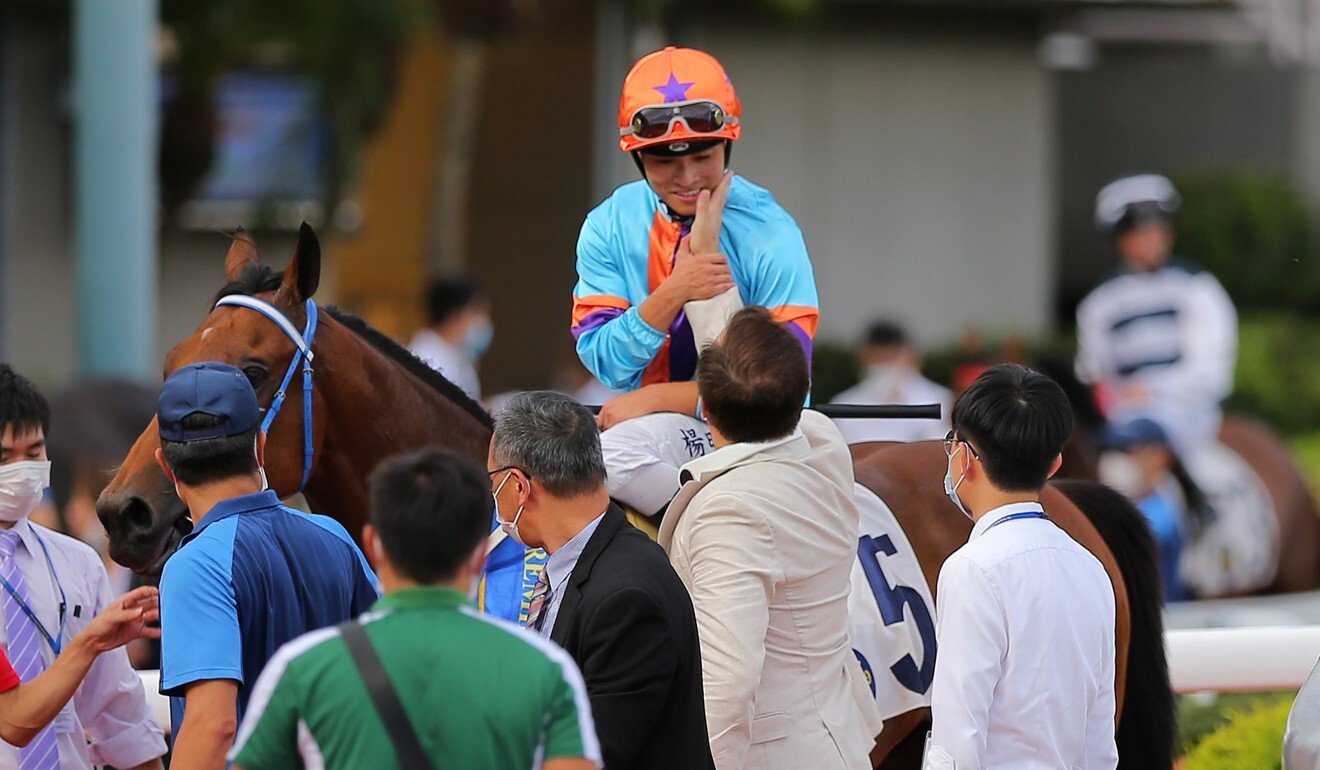 Trainer Caspar Fownes congratulates jockey Keith Yeung.