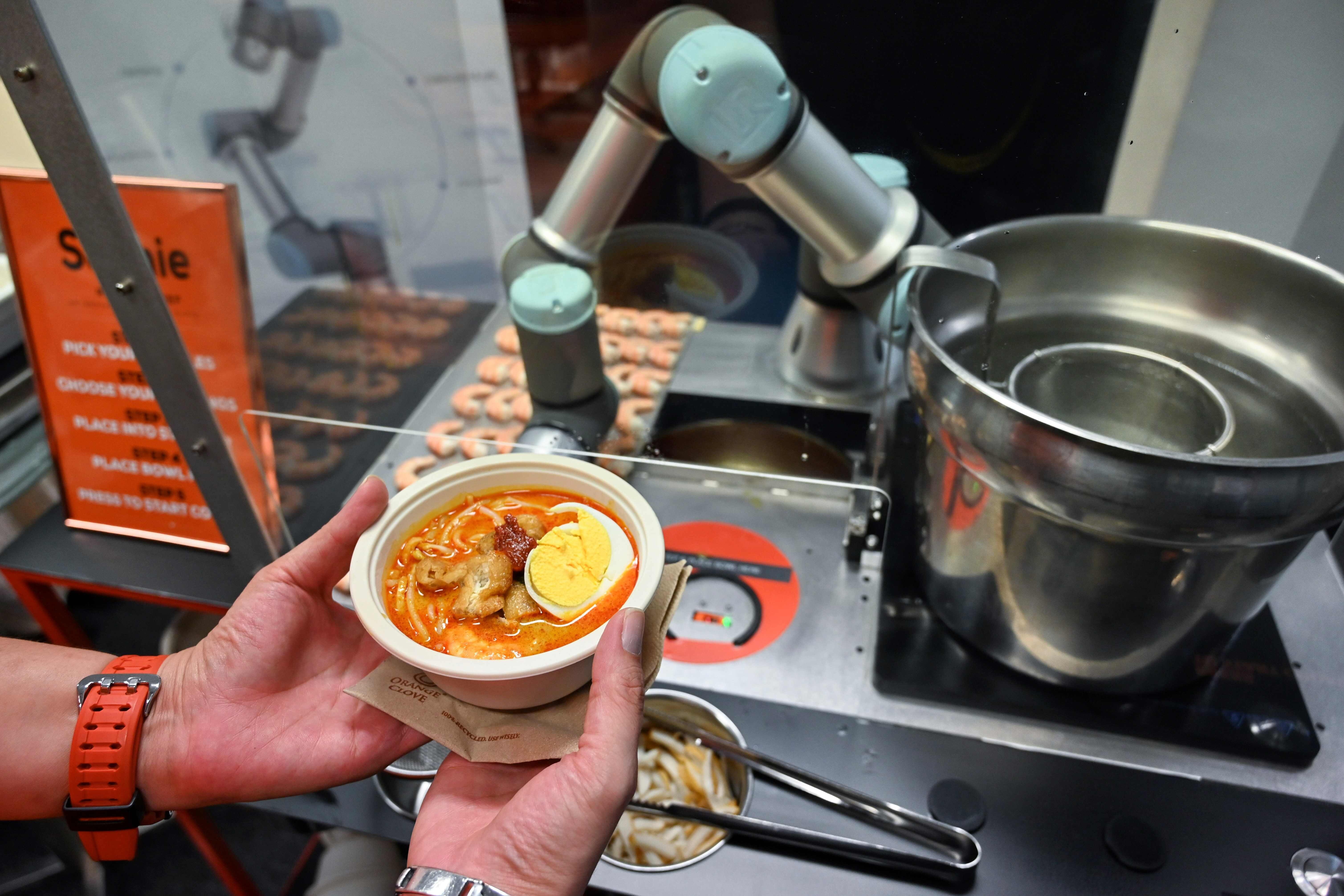 A bowl of laksa prepared by Sophie the robotic chef in Singapore. Photo: AFP