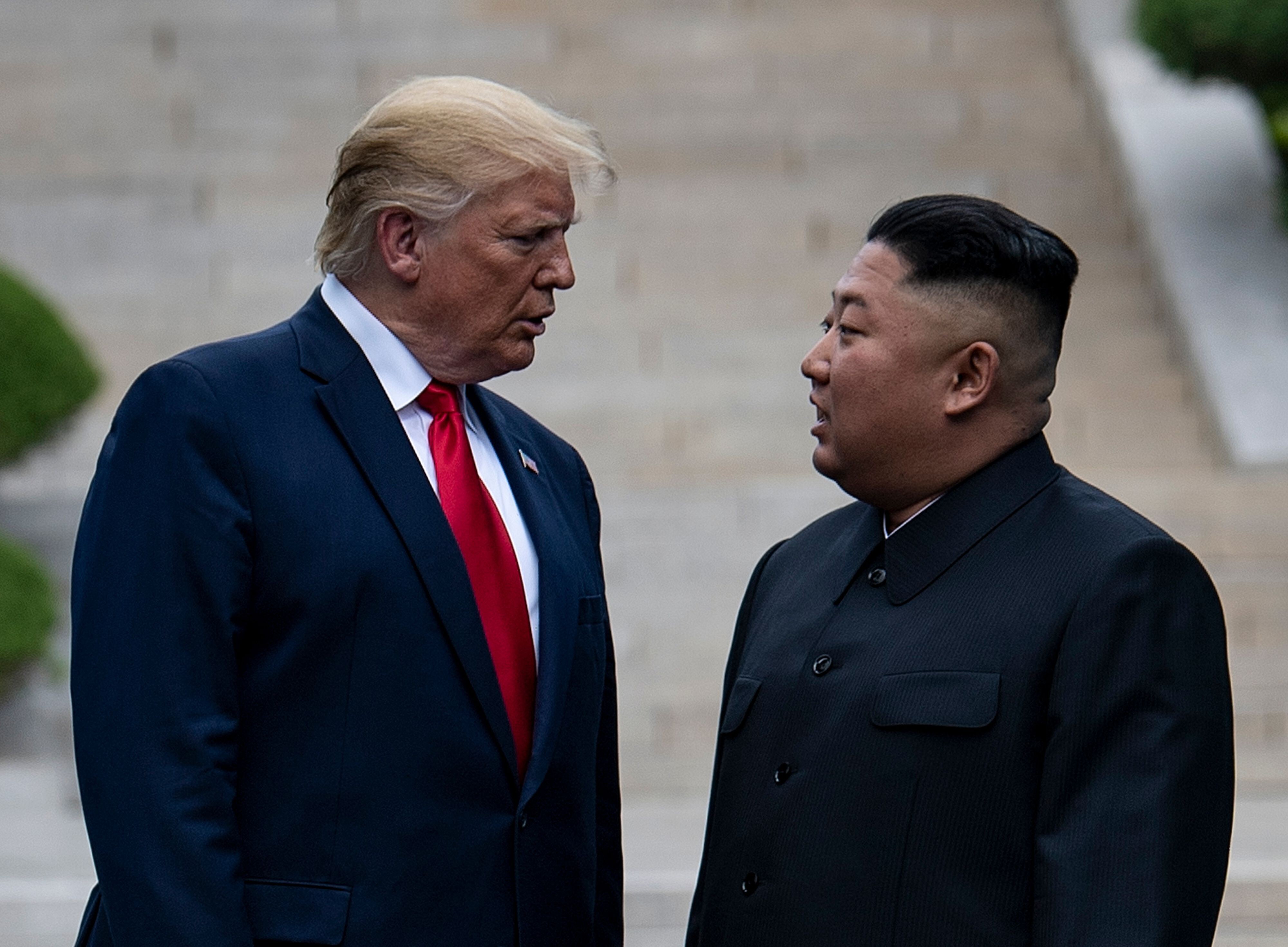 US President Donald Trump and Kim Jong-un stand on the North Korean side of the demilitarised zone in Panmunjom. Photo: AFP