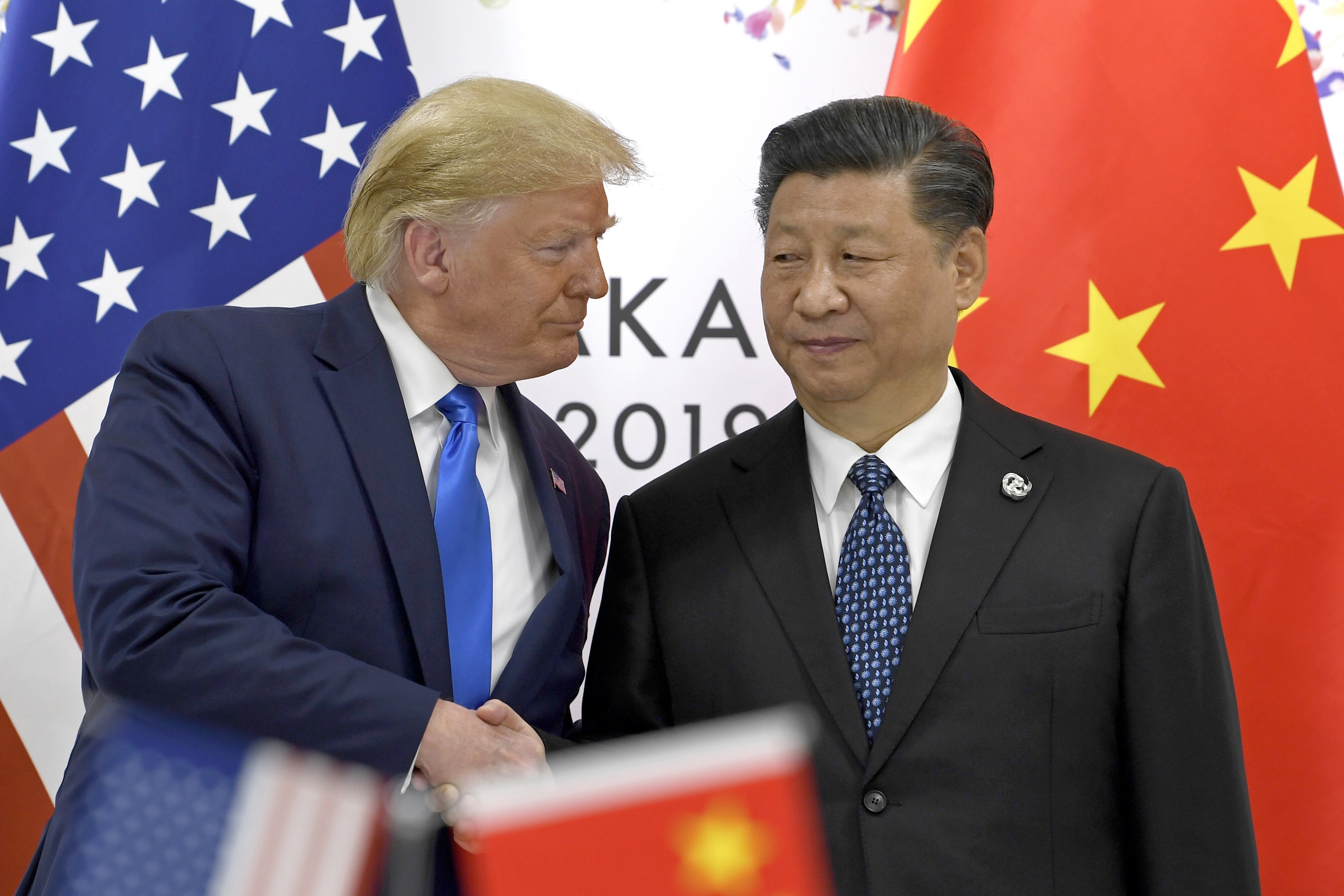 US President Donald Trump shakes hands with Chinese President Xi Jinping on the sidelines of the G20 summit in Osaka on June 29, 2019. File photo: AP