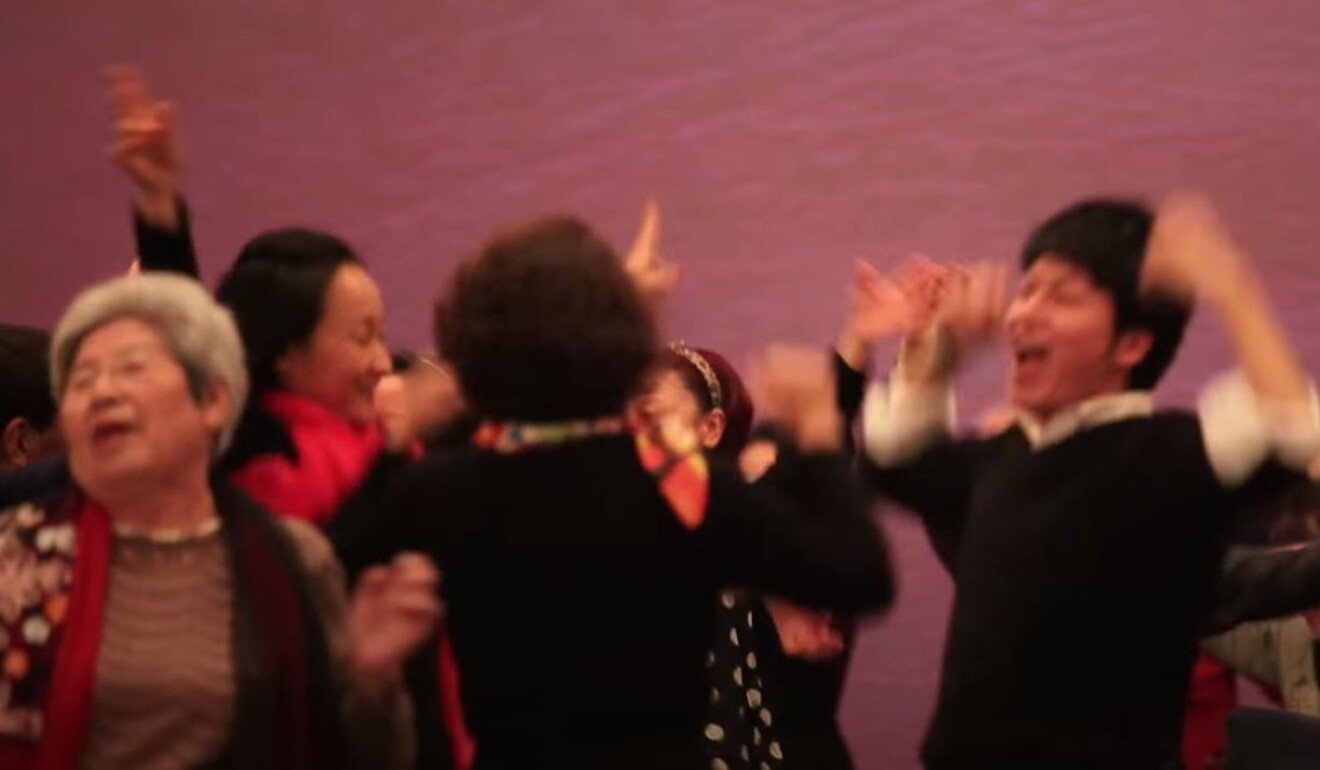 People dance ecstatically in a video posted on the Create Abundance YouTube channel in 2014. Photo: YouTube / Create Abundance