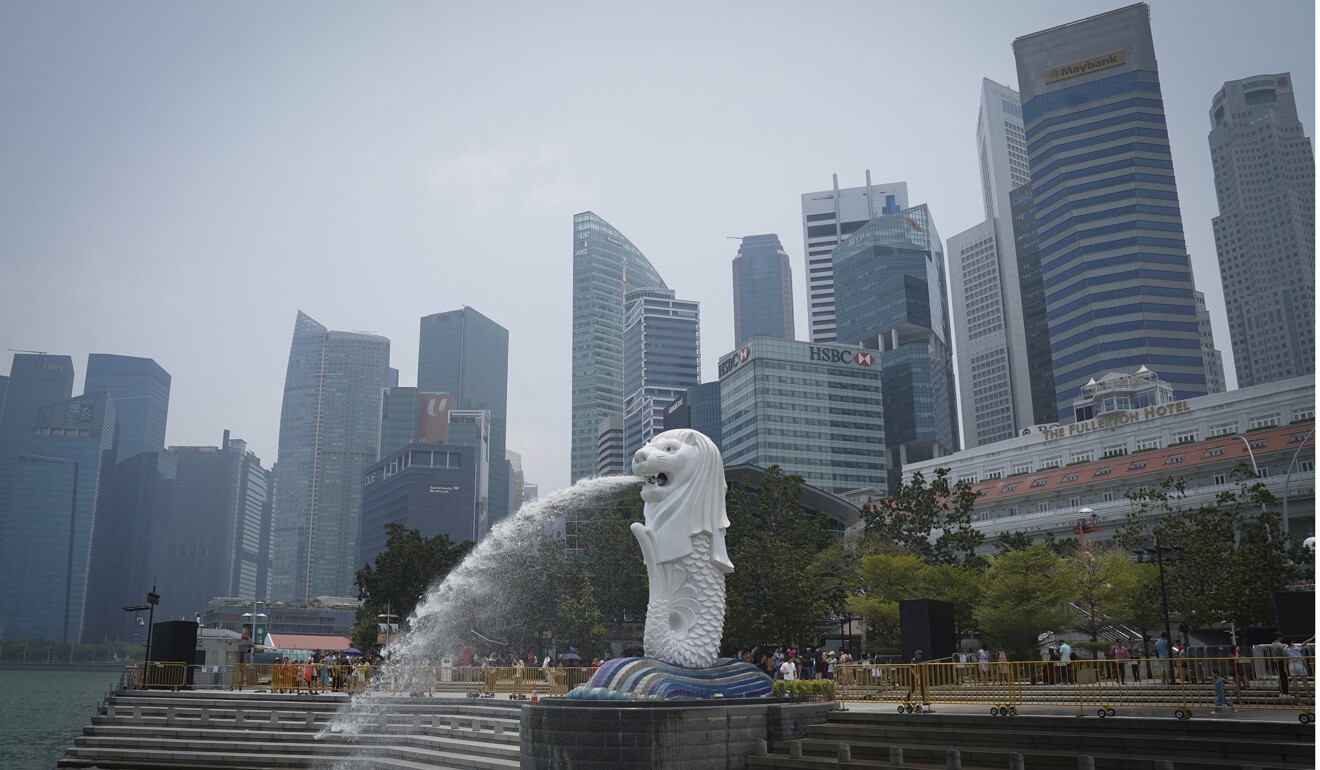Singapore’s Merlion statue with the background of business district. Photo: AP