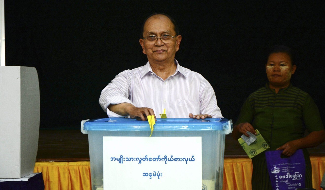 Thein Sein casts his vote in the 2015 elections. Photo: EPA