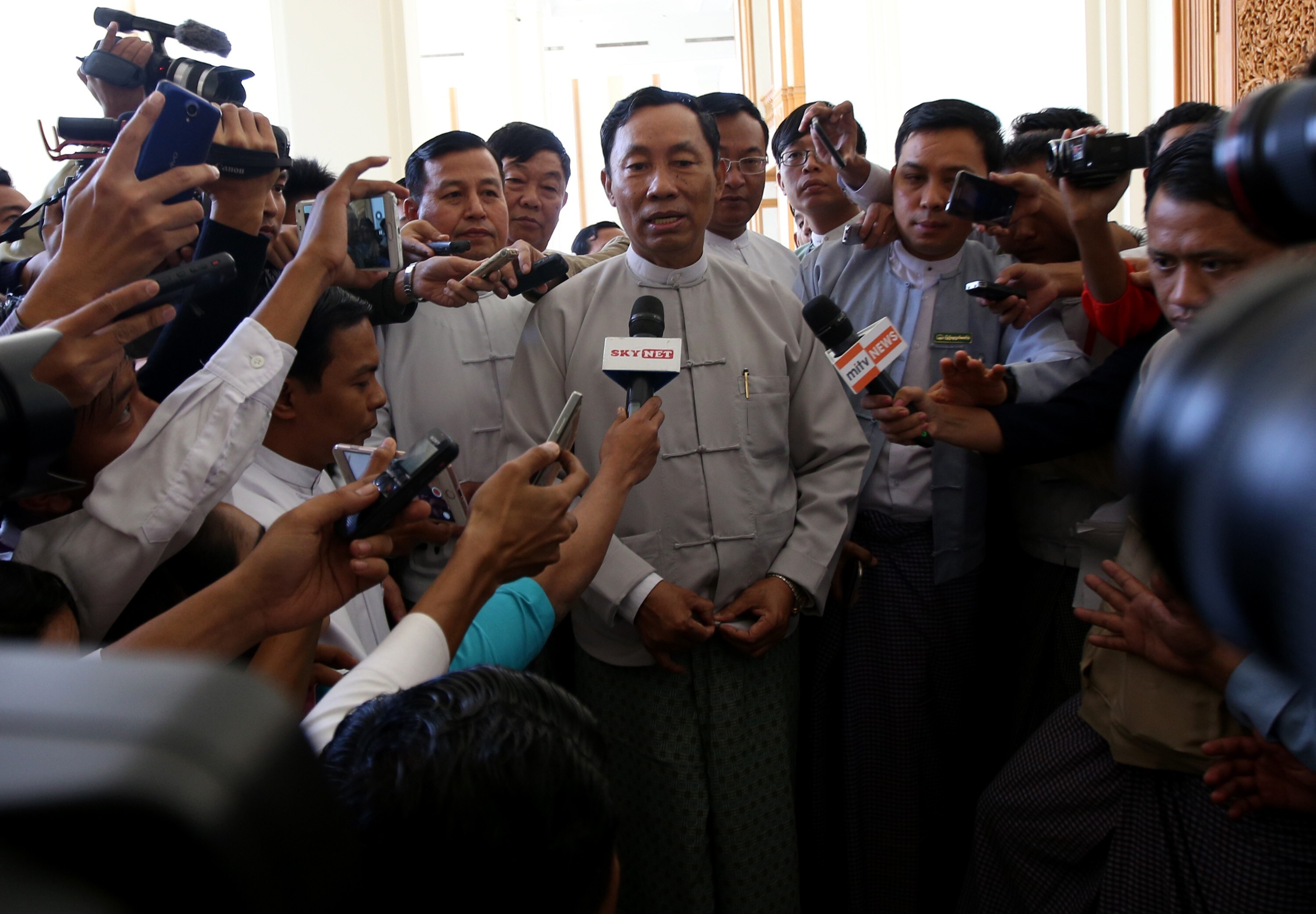 Shwe Mann speaks to media outside the first session of the new parliament in 2016. Photo: Xinhua