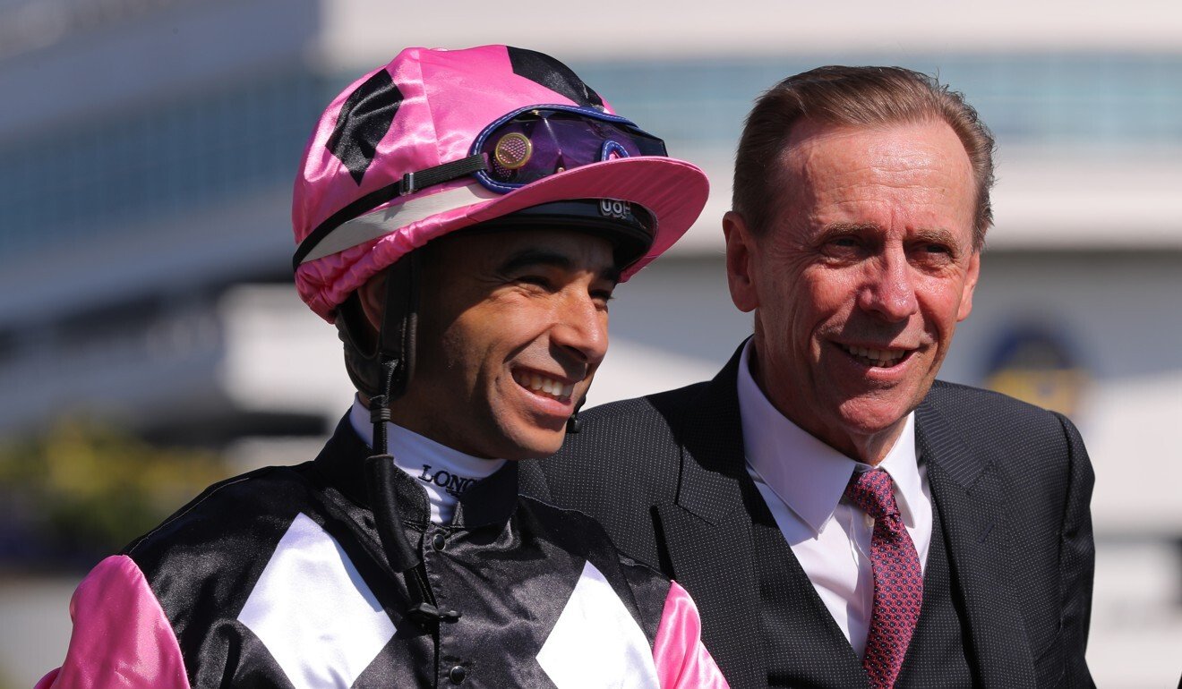 Jockey Joao Moreira with trainer John Size after a win from Beauty Applause.