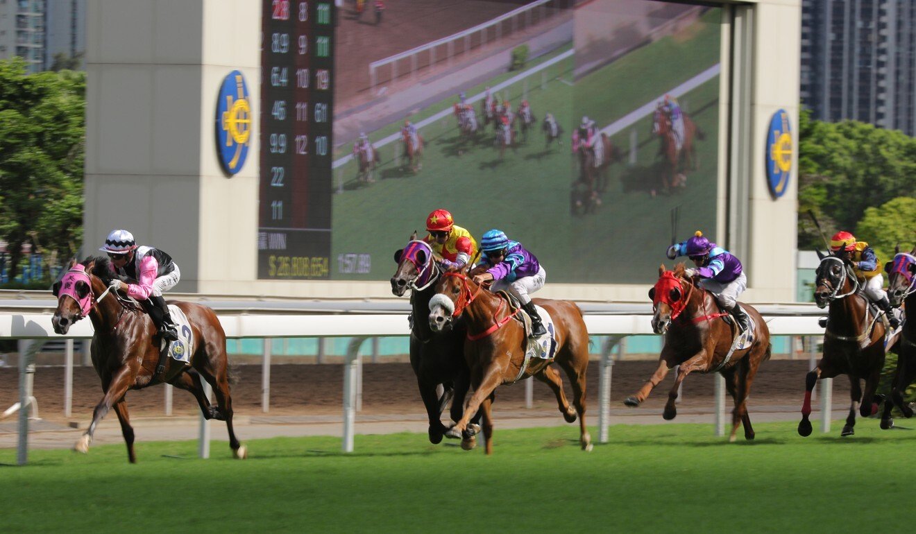 Beauty Happy holds on to win at Sha Tin on Saturday.