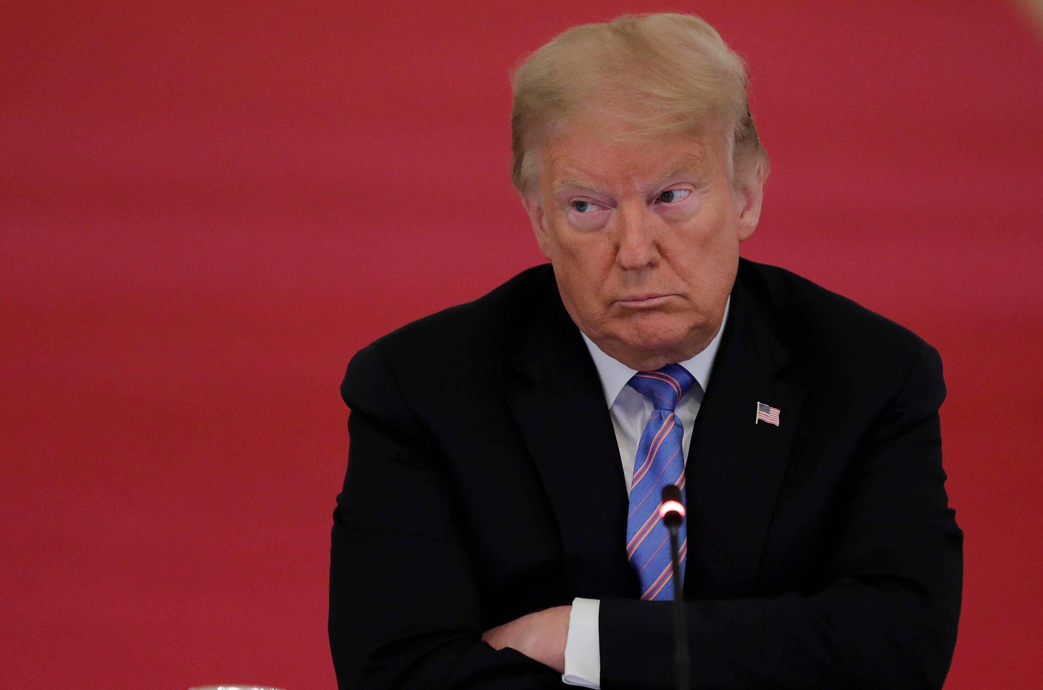 US President Donald Trump listens during a meeting of the American Workforce Policy Advisory Board in the White House on June 26. His administration has accelerated the erosion of international order and rule of law by disregarding or withdrawing from a number of institutions. Photo: Reuters