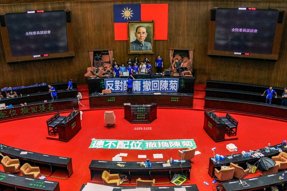 A group of more than 20 lawmakers from Taiwan’s main opposition party the Kuomintang (KMT) occupy the Legislature Yuan in Taipei. Photo: Reuters