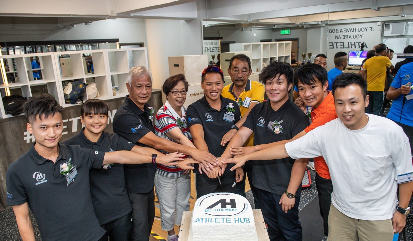Roy Cheng, Wong Kam-po (second right) and others at the opening of Athletes Hub.