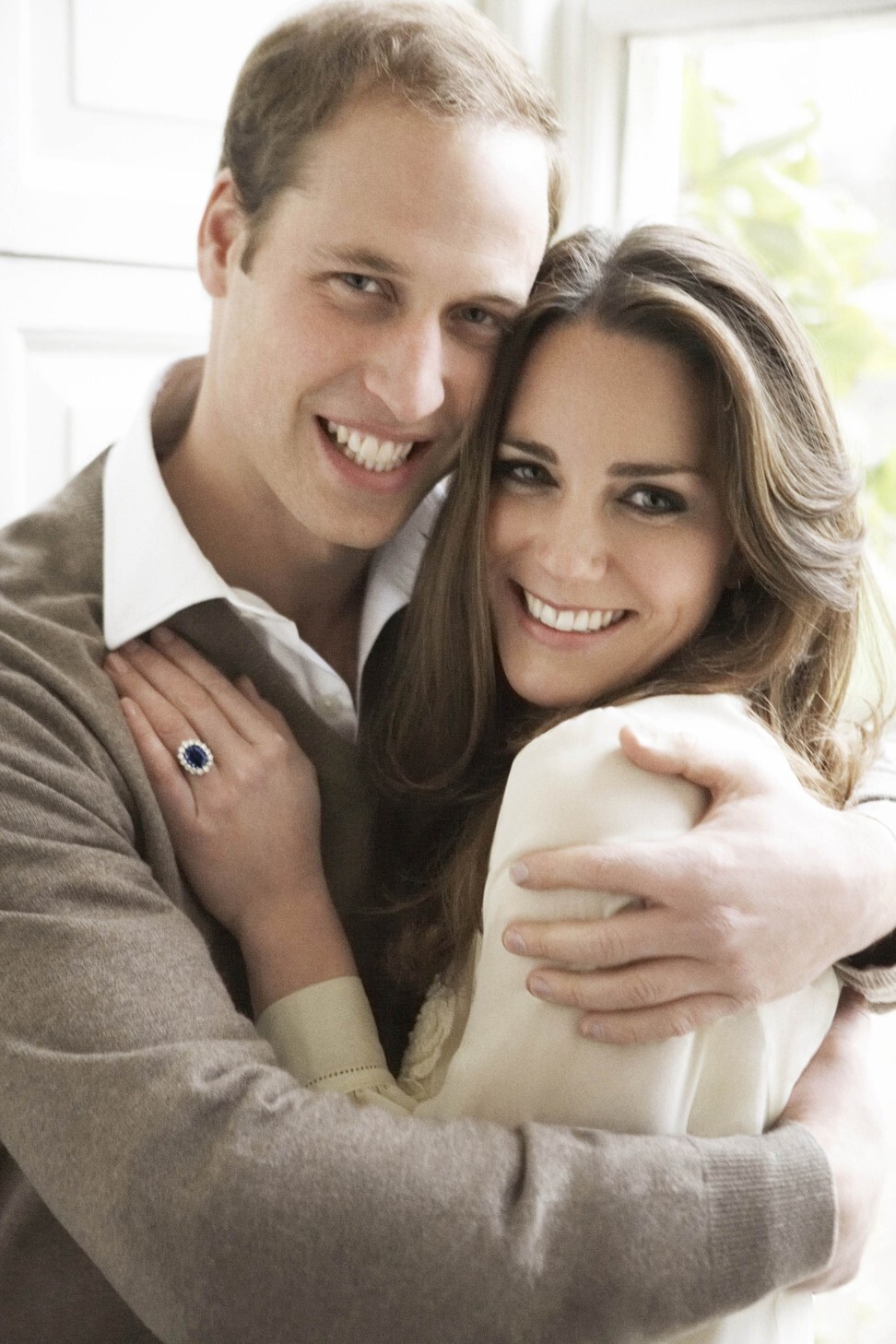 William and Kate, who is wearing the sapphire ring in their engagement photo. Photo: AFP