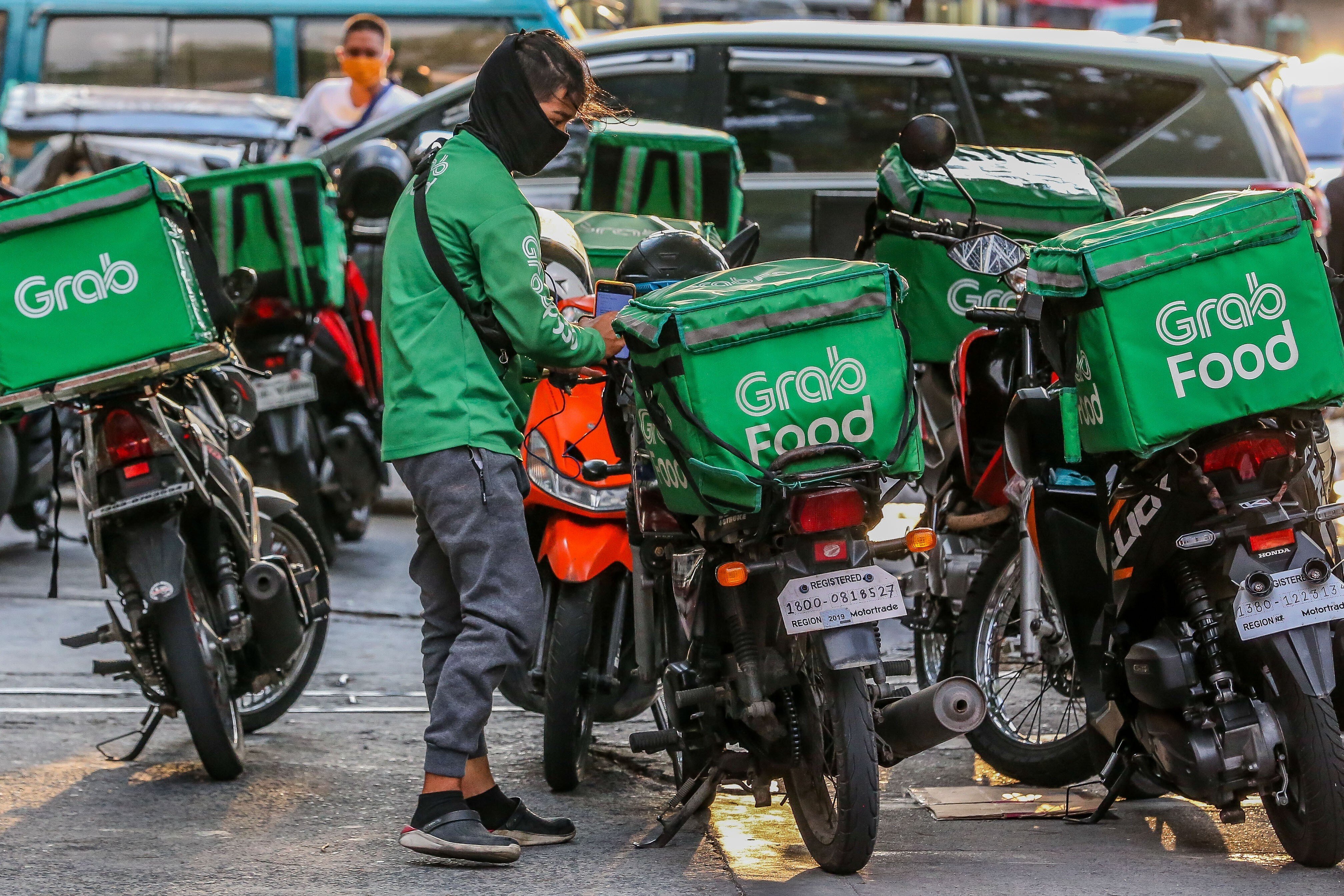 Grab employed 64,000 drivers over the course of the six-week lockdown. Photo: Xinhua