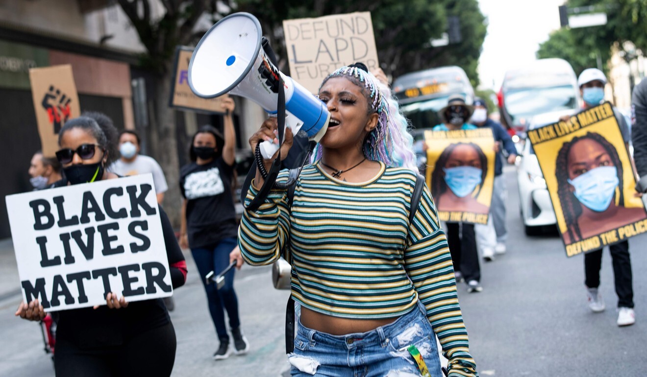 People march during a Black Livers Matter protest in Los Angeles on Monday. Nearly 90 per cent of black Americans back Joe Biden over Donald Trump. Photo: AFP
