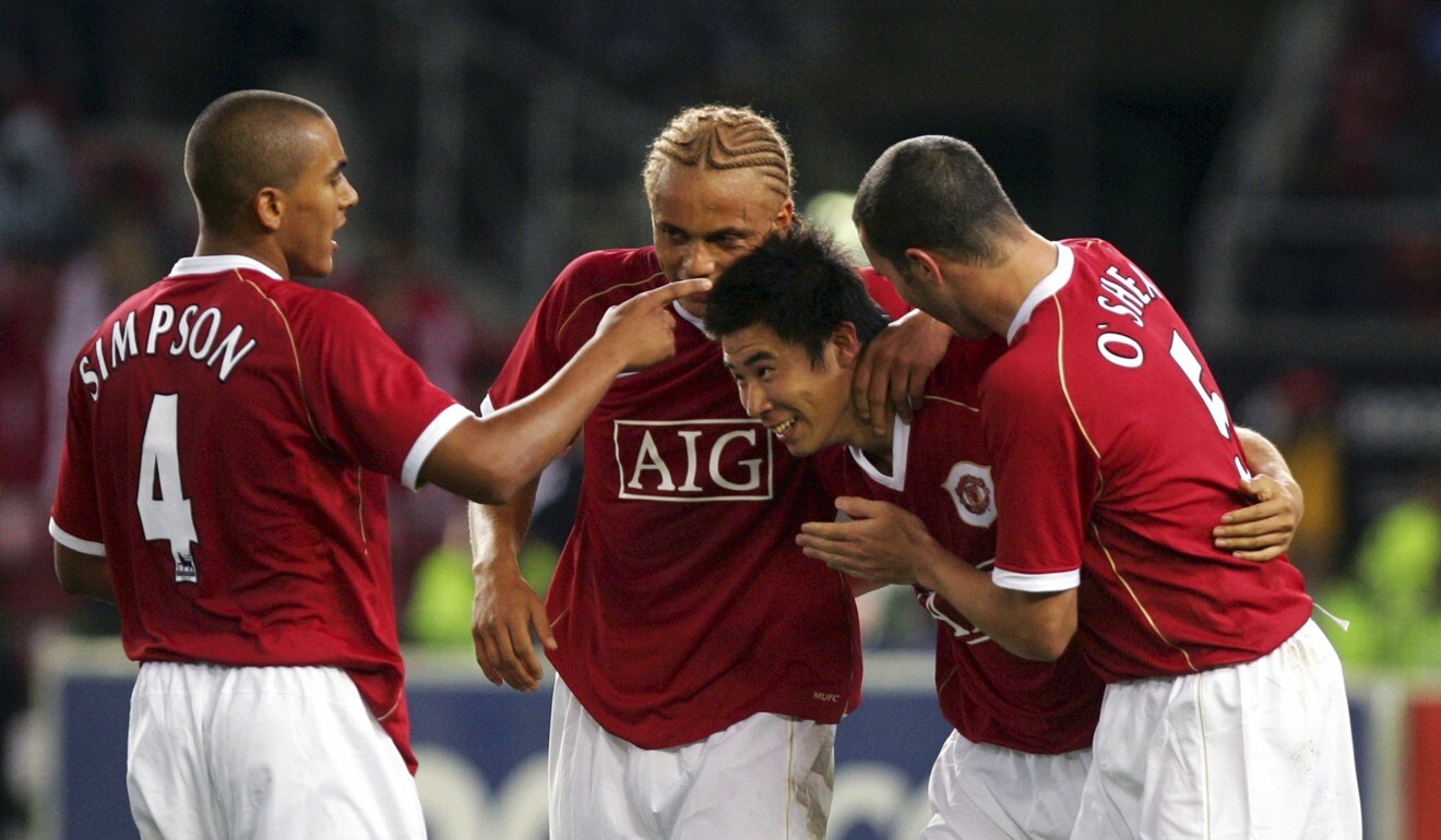 Manchester United’s Dong Fangzhuo celebrates with teammates Danny Simpson, Wes Brown and John O'Shea after scoring in a 2006 friendly. Photo: Reuters